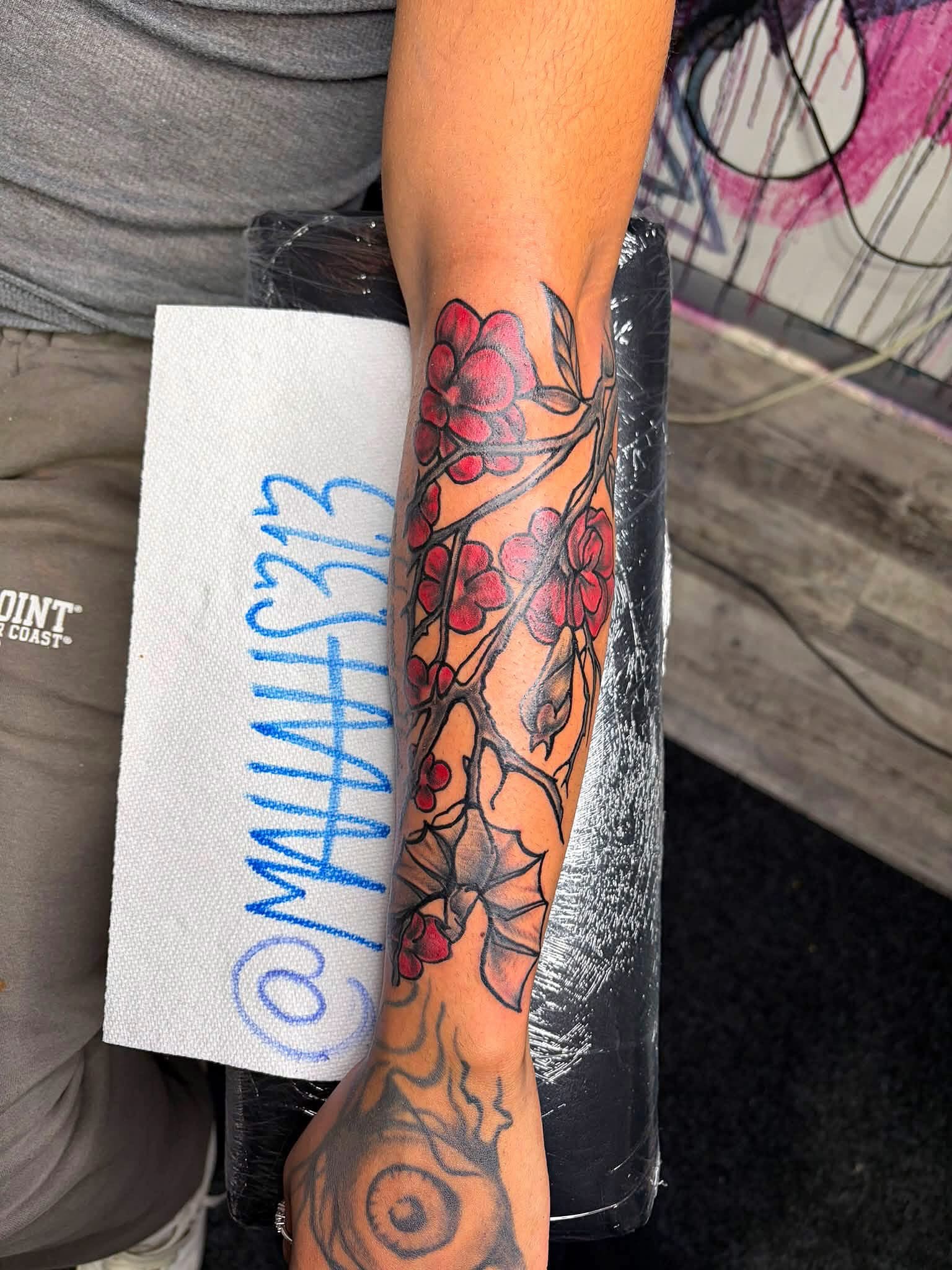 Cherry blossom branch American traditional tattoo on the forearm by 🔥Matt Tatts 313🔥