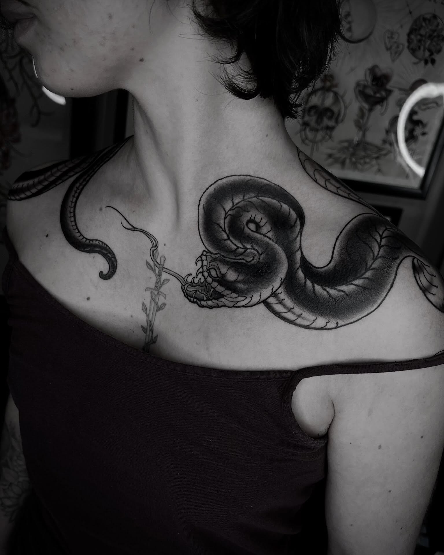 Snake realism tattoo on the shoulder by Lorenzo Gomez, San Diego, California