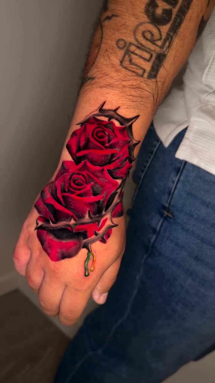 Roses and thorns realism tattoo by Danny Vazquez