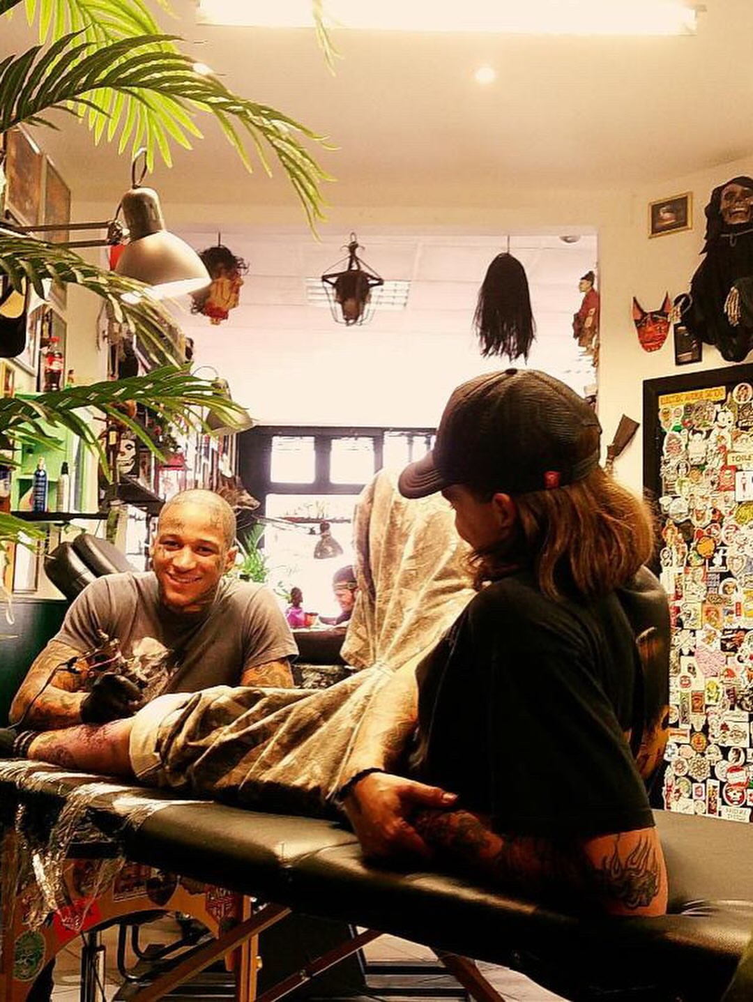Tattoo artist and client American traditional tattoo on the upper arm by Joshua Speight