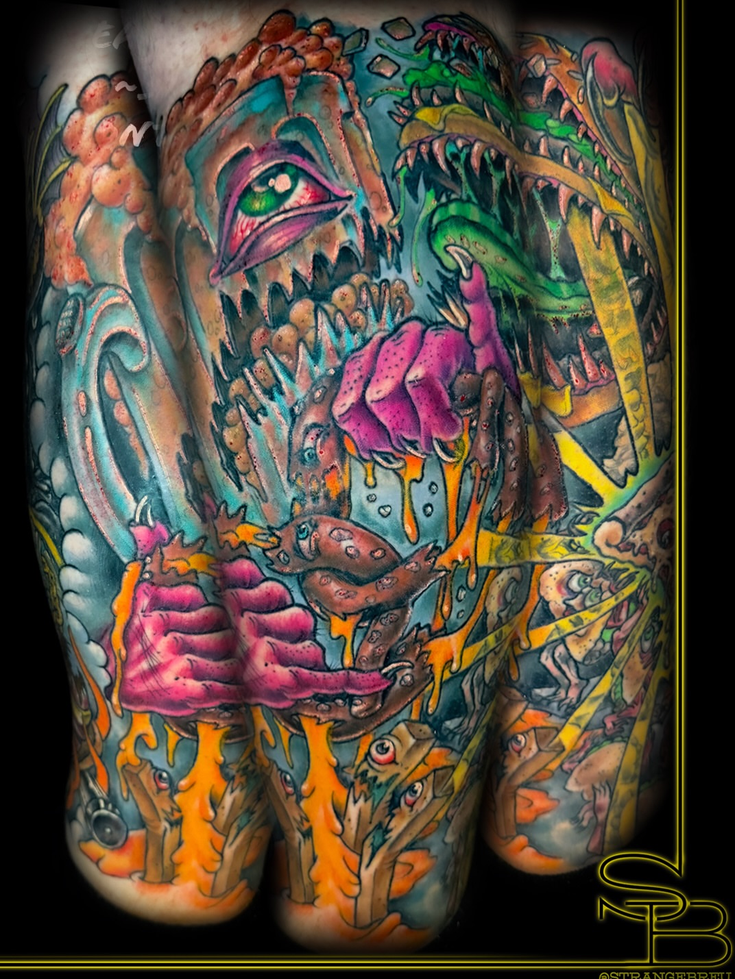 Monster surrealism tattoo on the thigh by Chris Breuer, Asbury Park, New Jersey