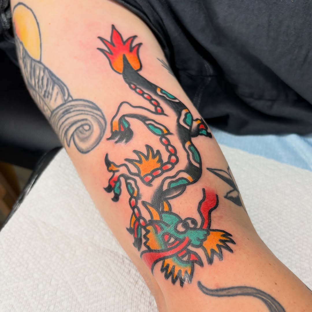 Dragon American traditional tattoo on the forearm by Braedon 🎱