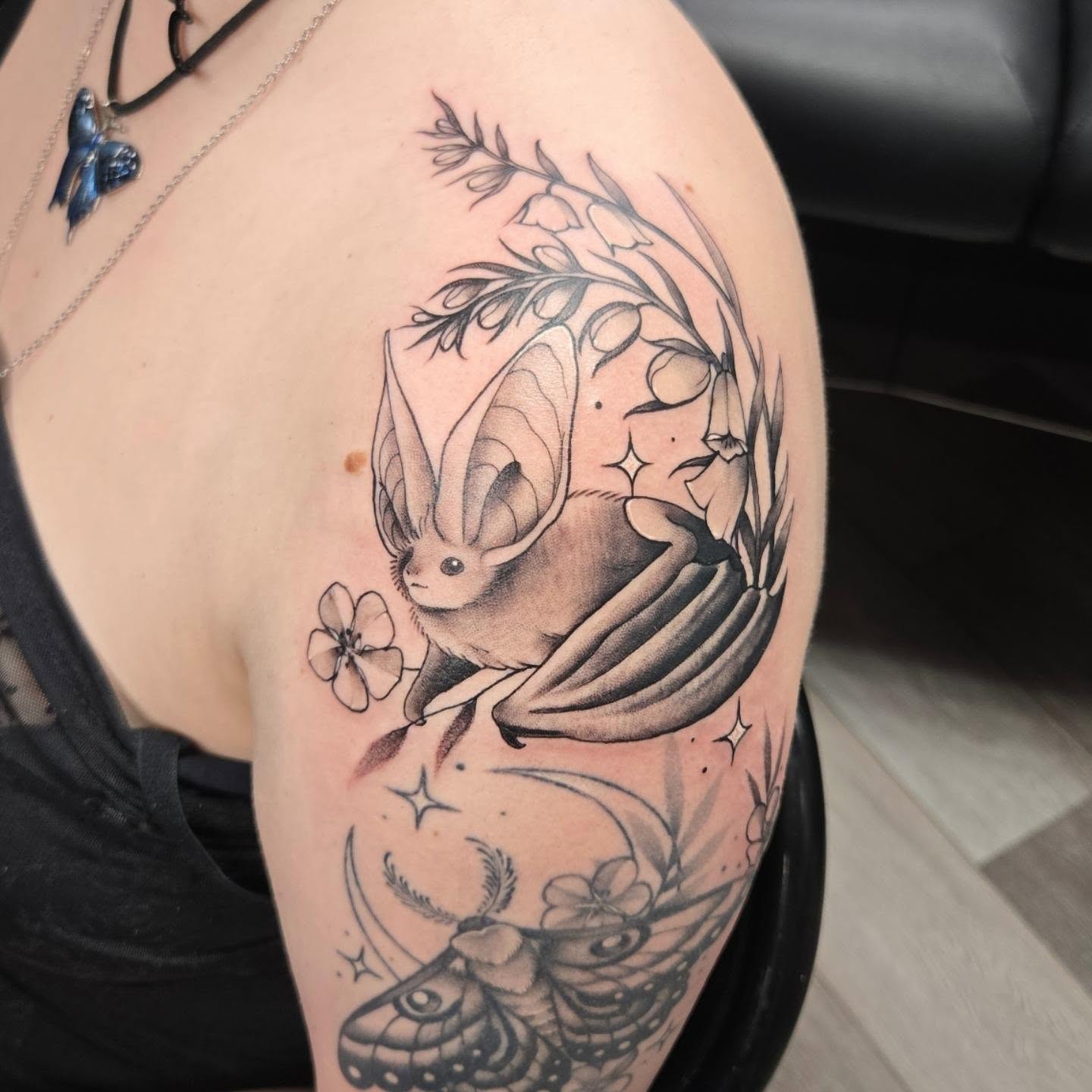 Rabbit and flowers realism tattoo on the shoulder by Britty Love, Nashville, Tennessee