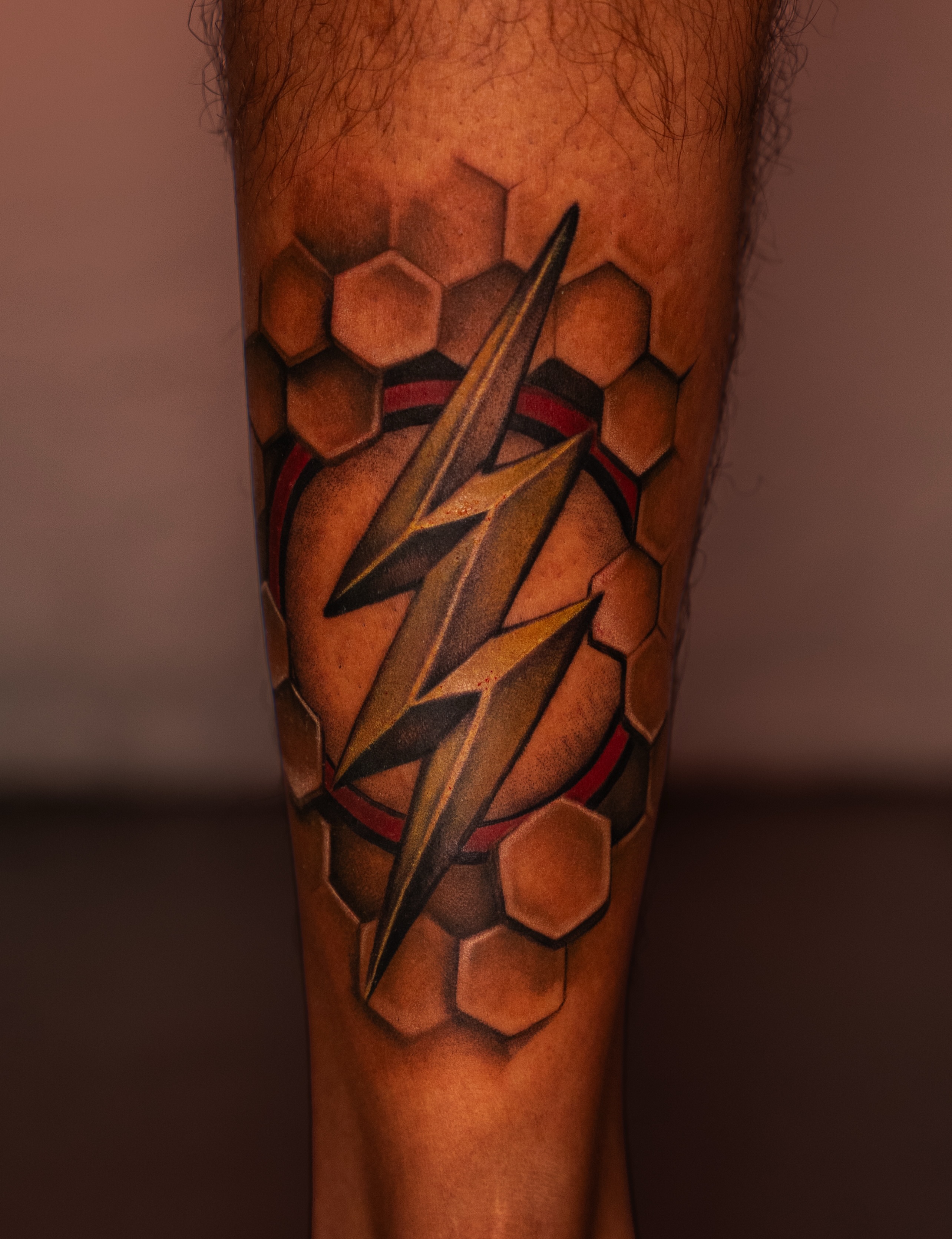 Lightning bolt geometric tattoo on the forearm by Lisa