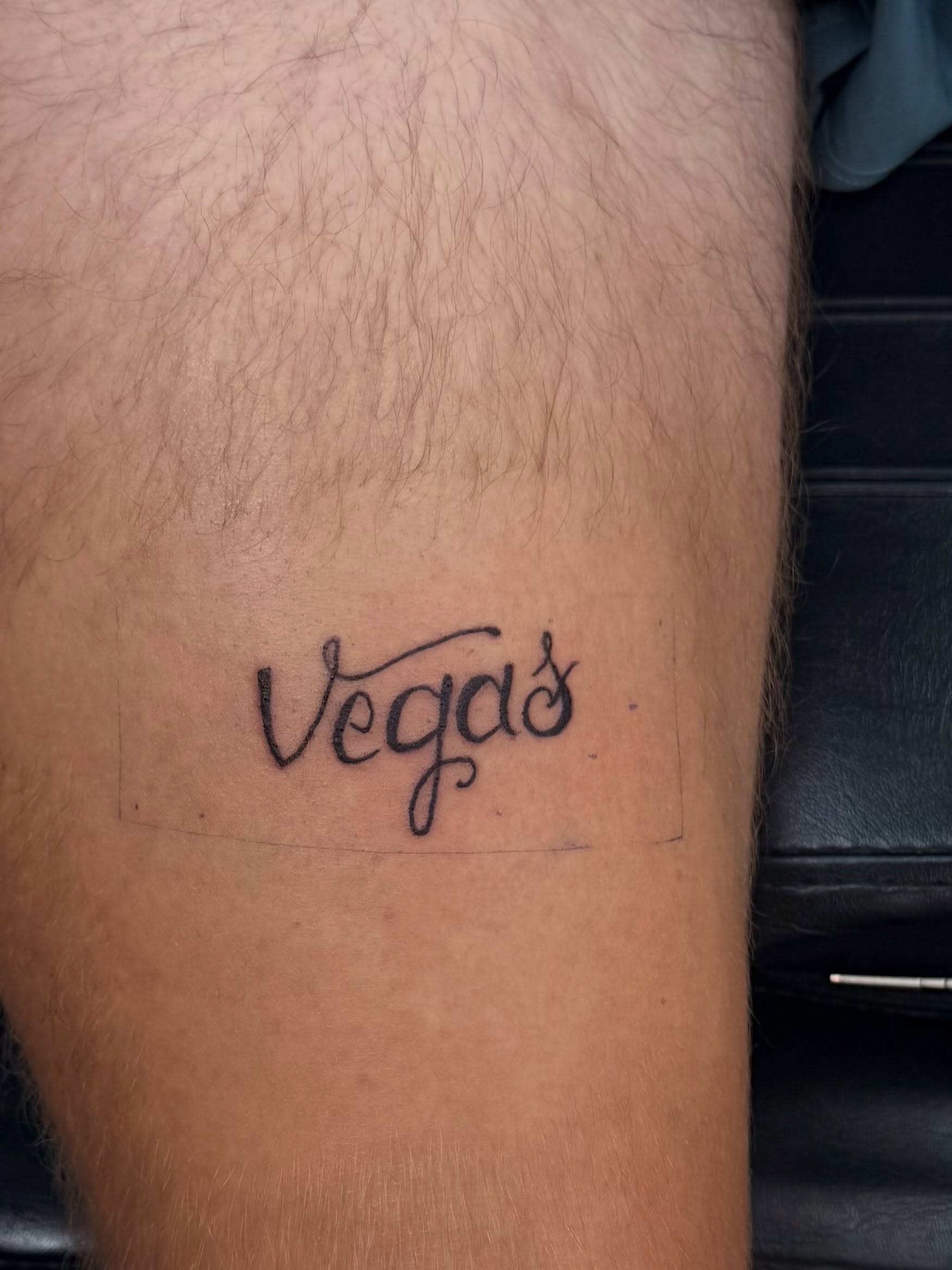 Vegas lettering script tattoo on the forearm by Rylan Thorndyke - Tattoo Artist, Las Vegas, Nevada