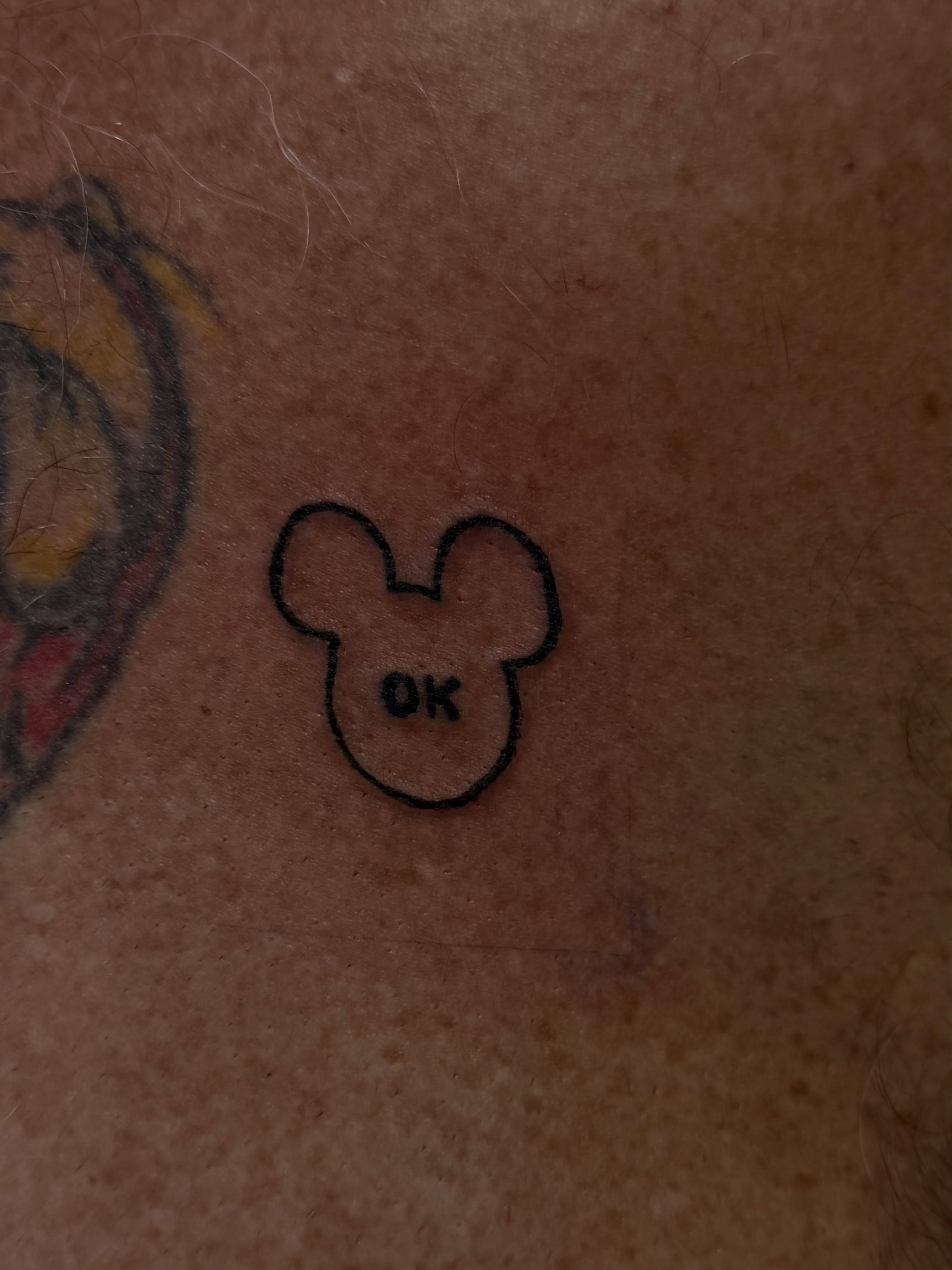 Mickey mouse head minimalist tattoo by Rylan Thorndyke - Tattoo Artist, Las Vegas, Nevada