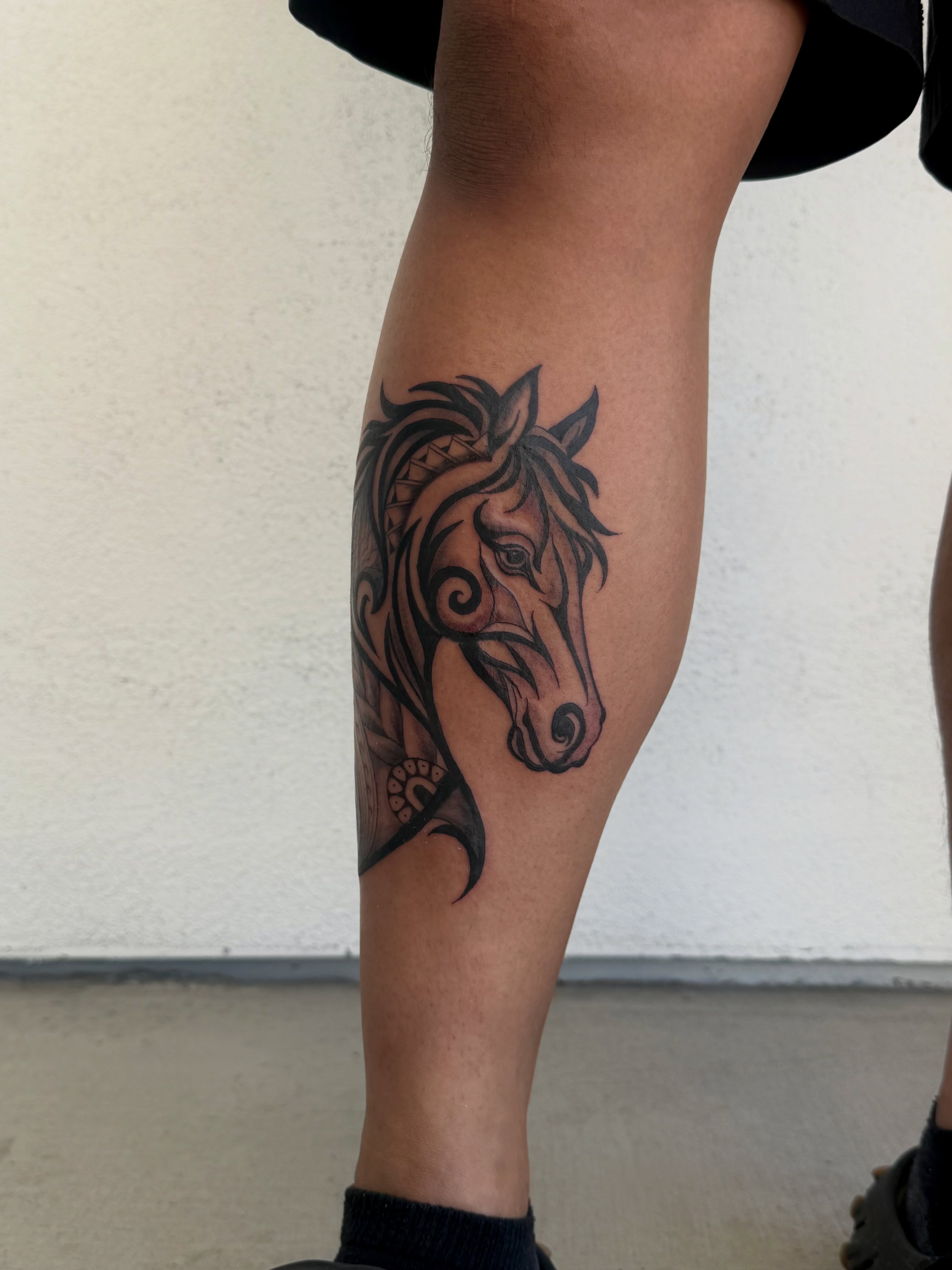 Horse head black and grey tattoo on the forearm by Healoha “Lindelle” Kamanu