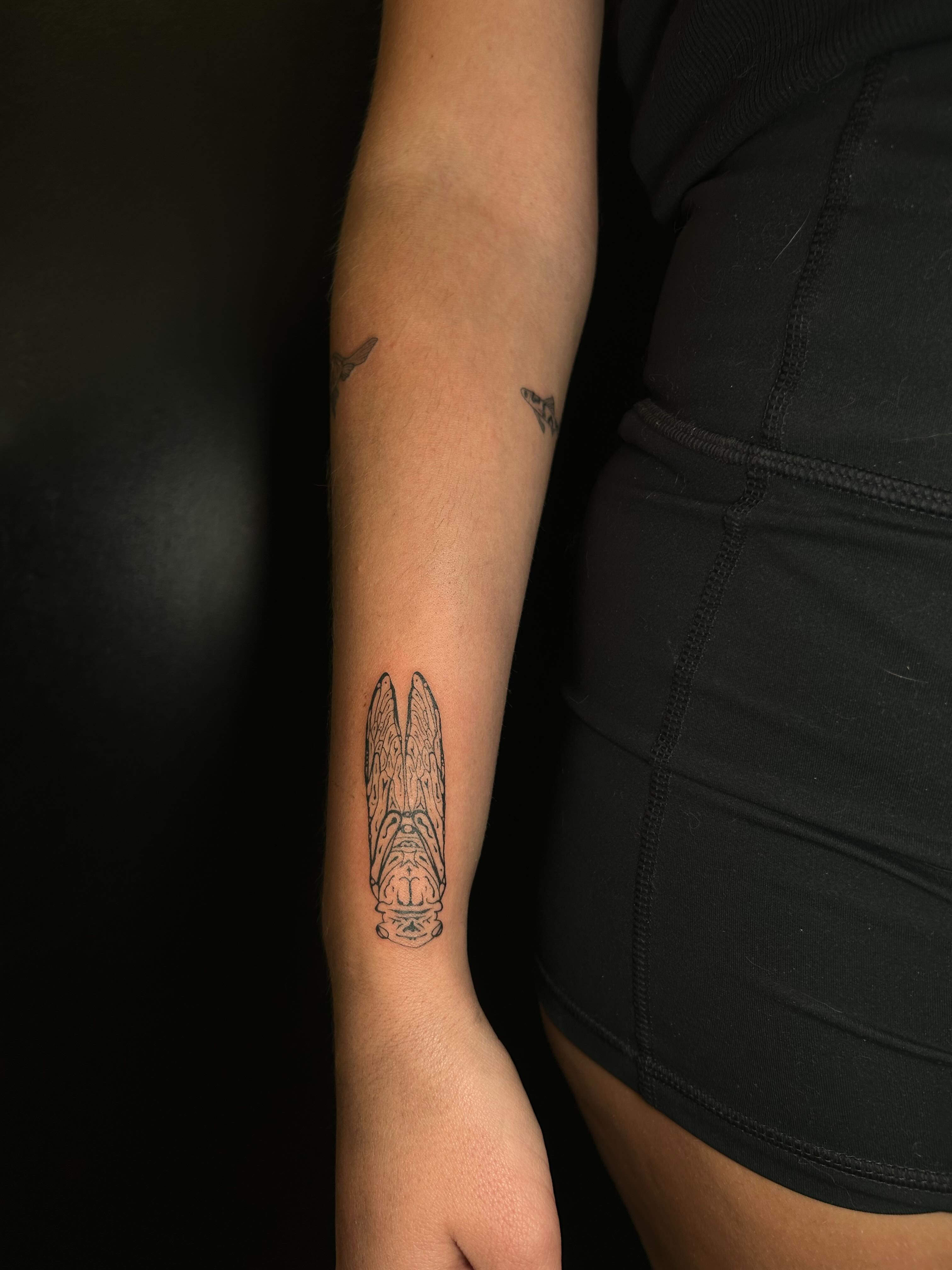 Wings black and grey tattoo on the forearm by L i v π Tattoo Artist. AMITY TATTOO