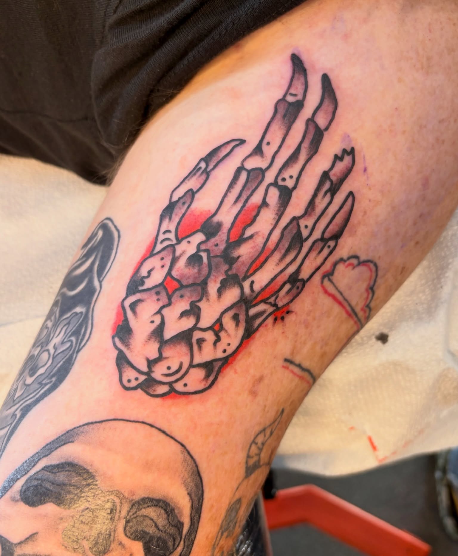 Skeleton hand black and grey tattoo on the forearm by Sammy Tattoo, Austin, Texas