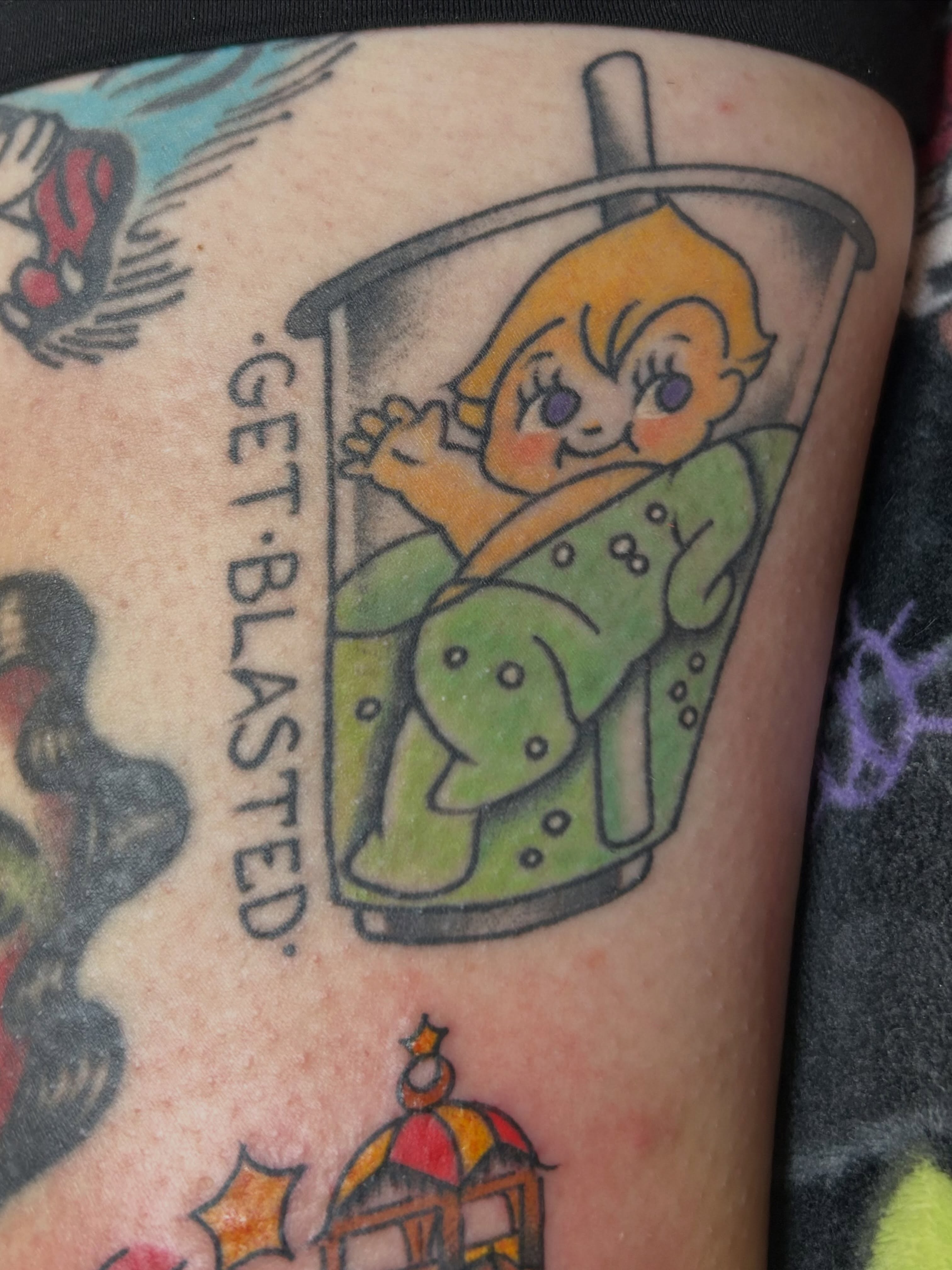 Tinkerbell in drink cup American traditional tattoo on the forearm by Kelsey Lyons