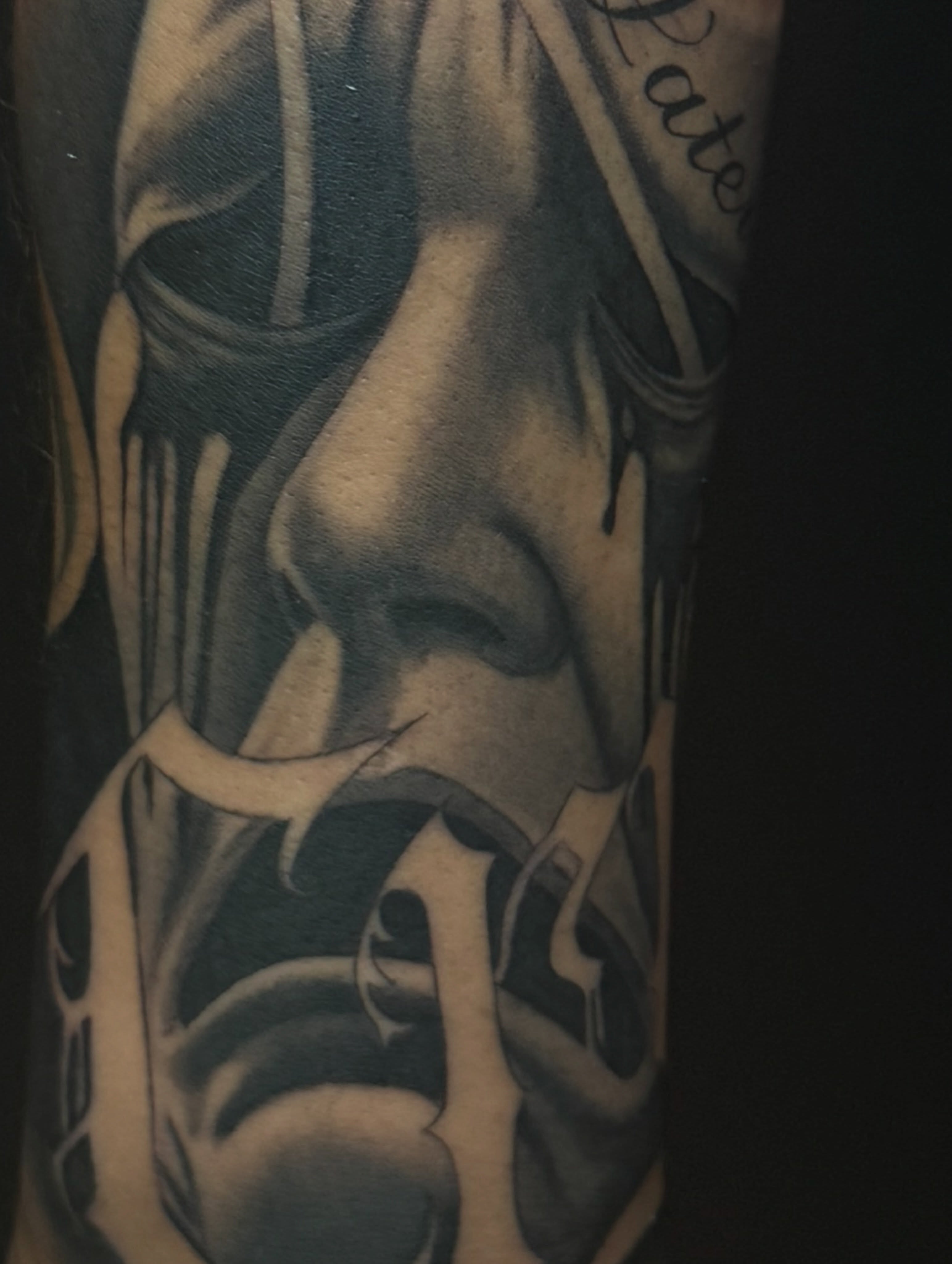 Tattoo by @elian.tattoos — realism, black_and_grey
