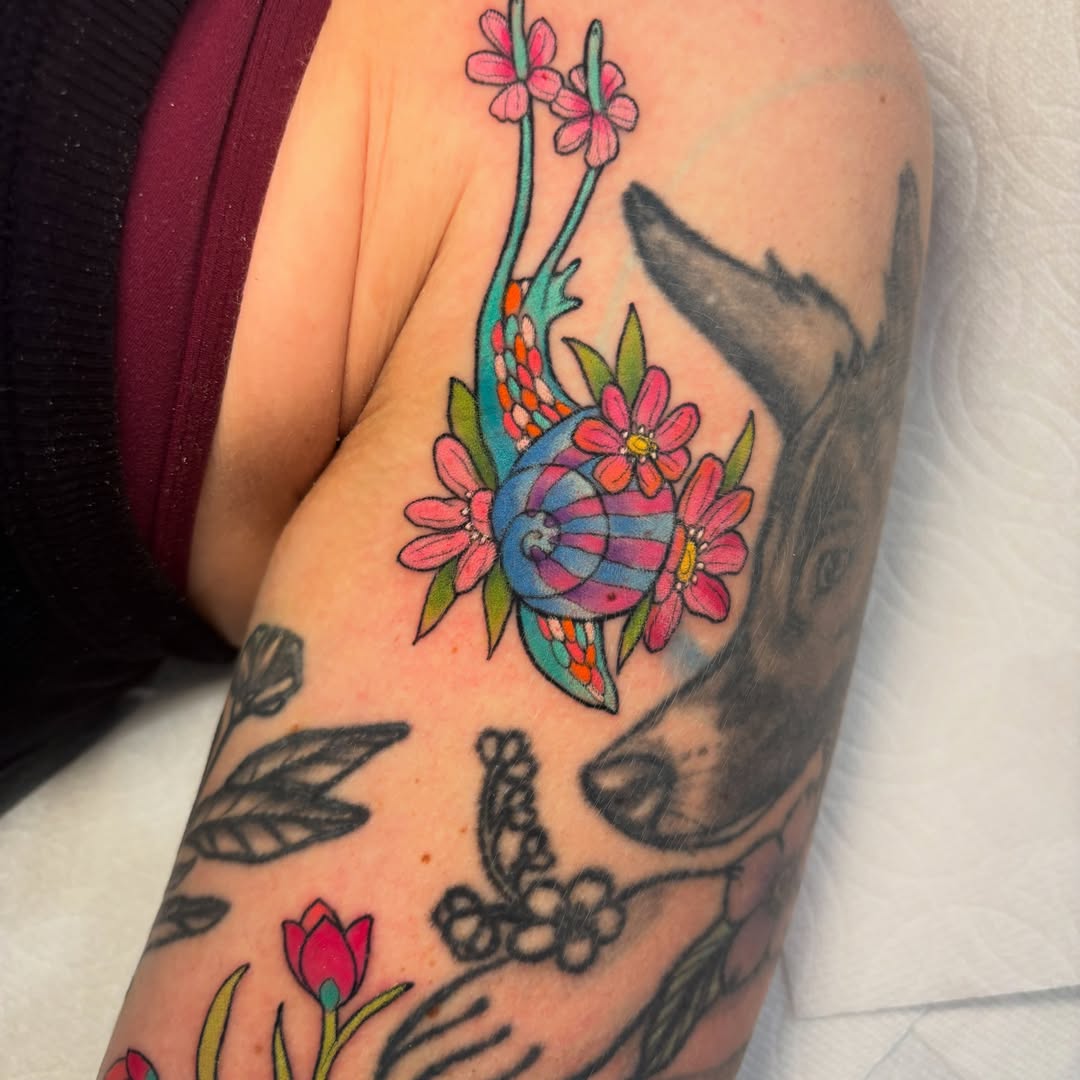 Flowers and skull American traditional tattoo on the forearm by ✨REiD✨