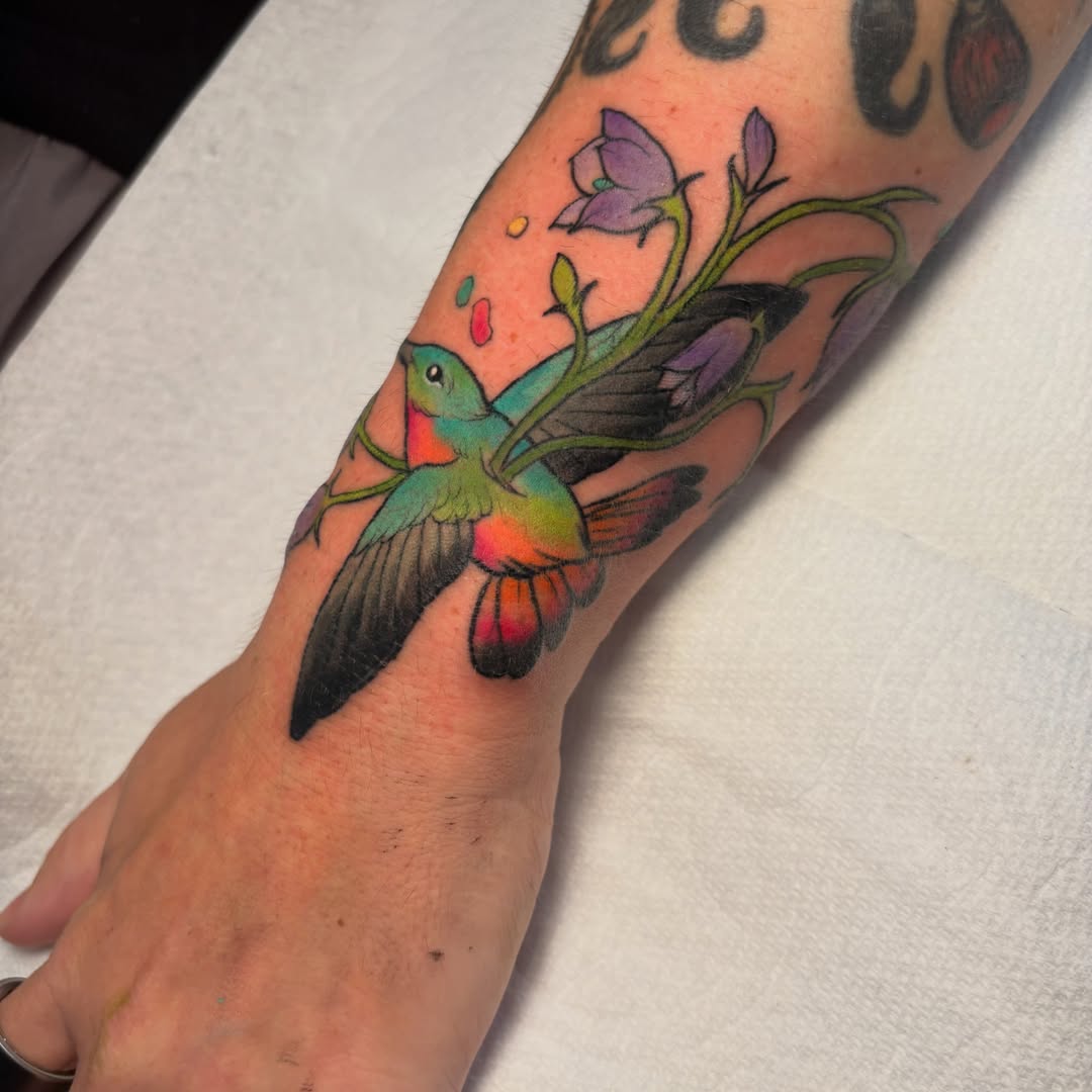 Hummingbird and flowers new school tattoo on the forearm by ✨REiD✨