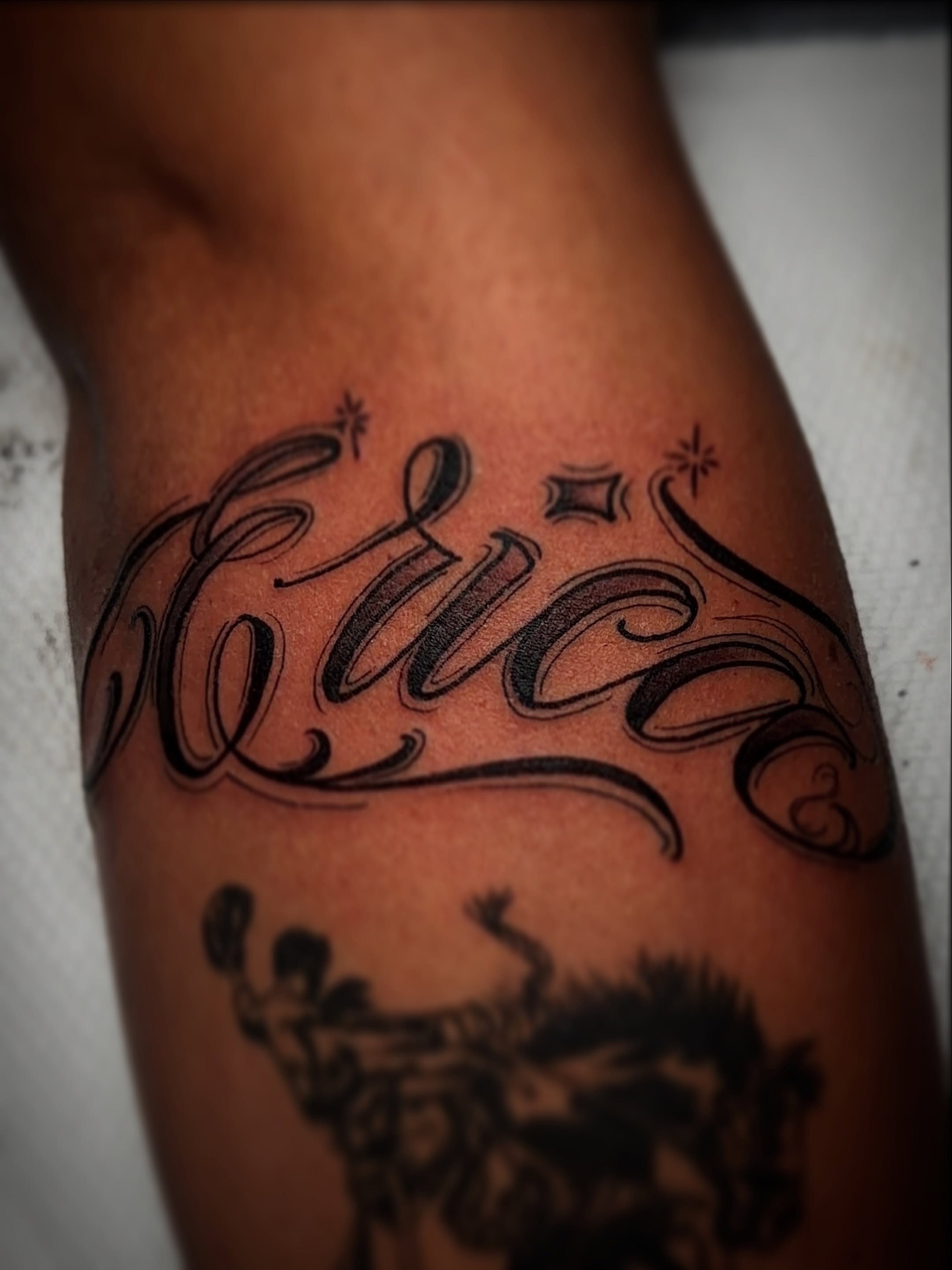 Tattoo by @doughboystabs — lettering_script
