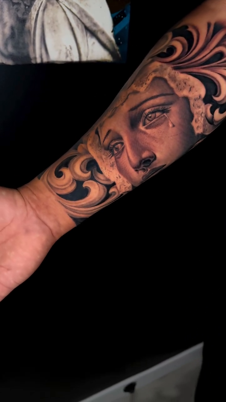 Woman's face with ornate filigree realism tattoo by Brandon Patino