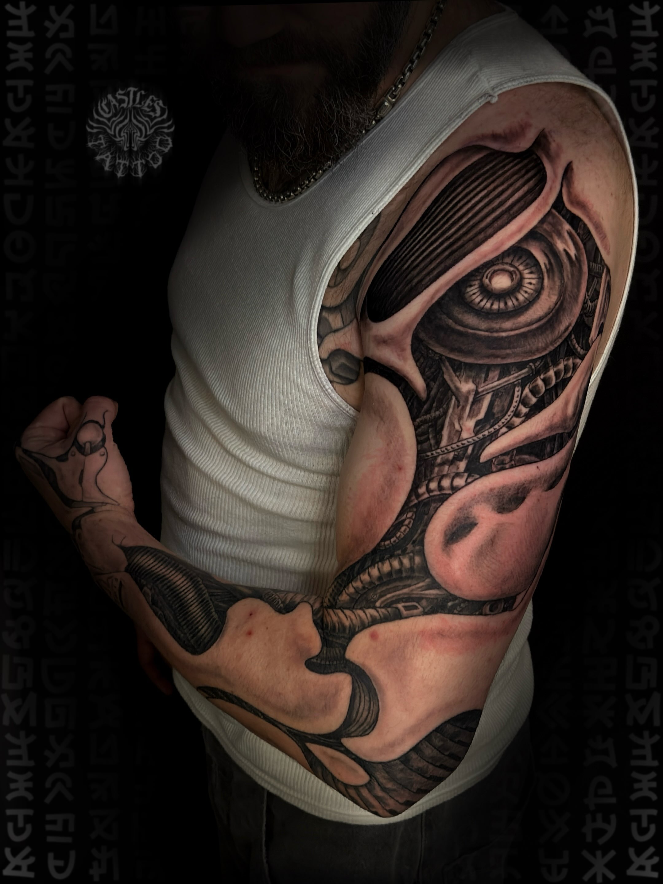 Cyborg eye realism tattoo on the shoulder by Erin Portland Tattoo Artist
