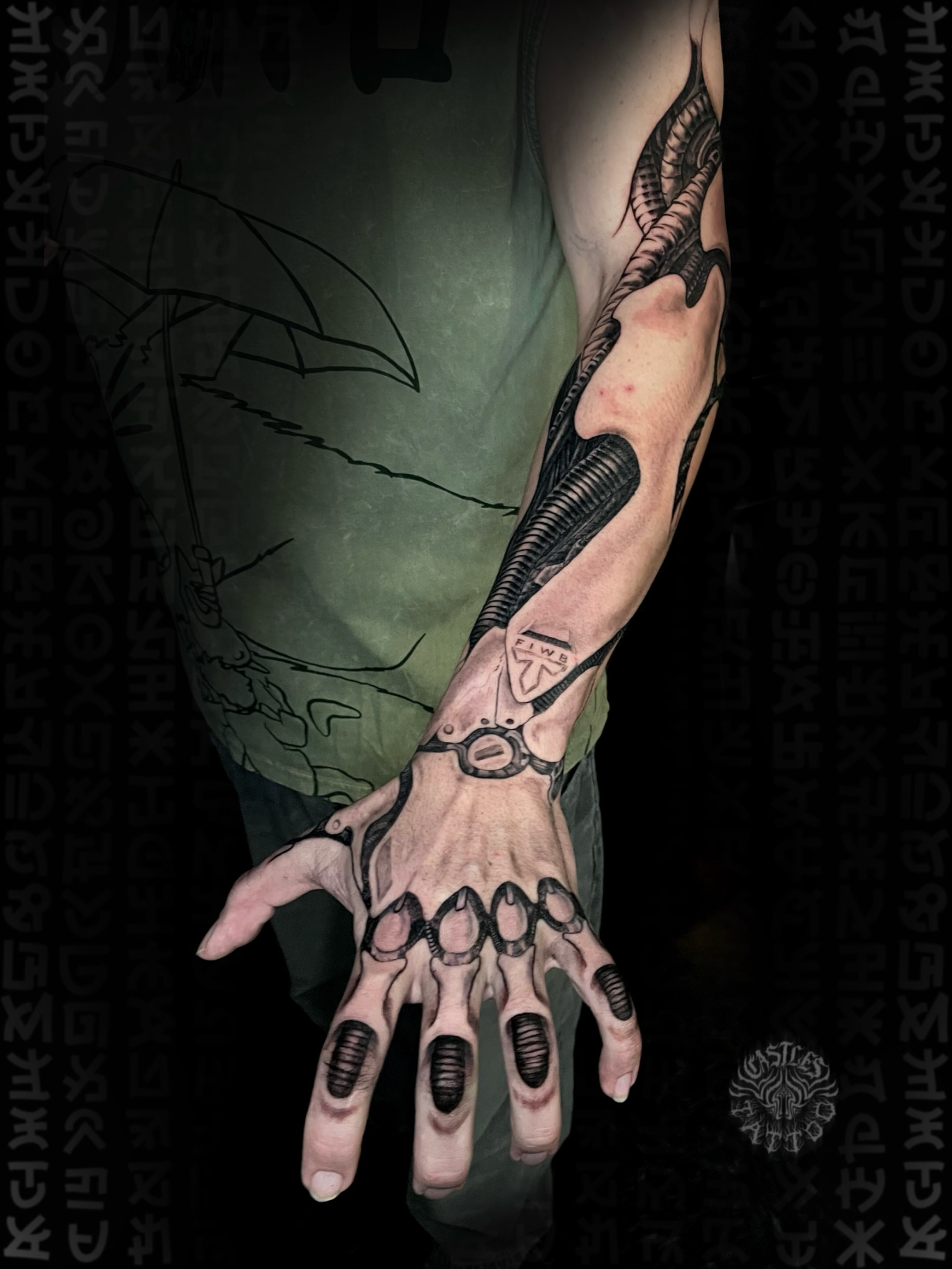 Mechanical hand geometric tattoo on the forearm by Erin Portland Tattoo Artist