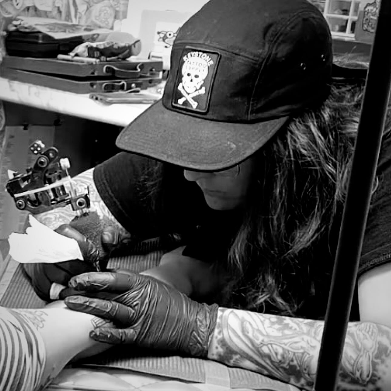 Tattoo artist black and grey tattoo on the upper arm by Ryan Slegel