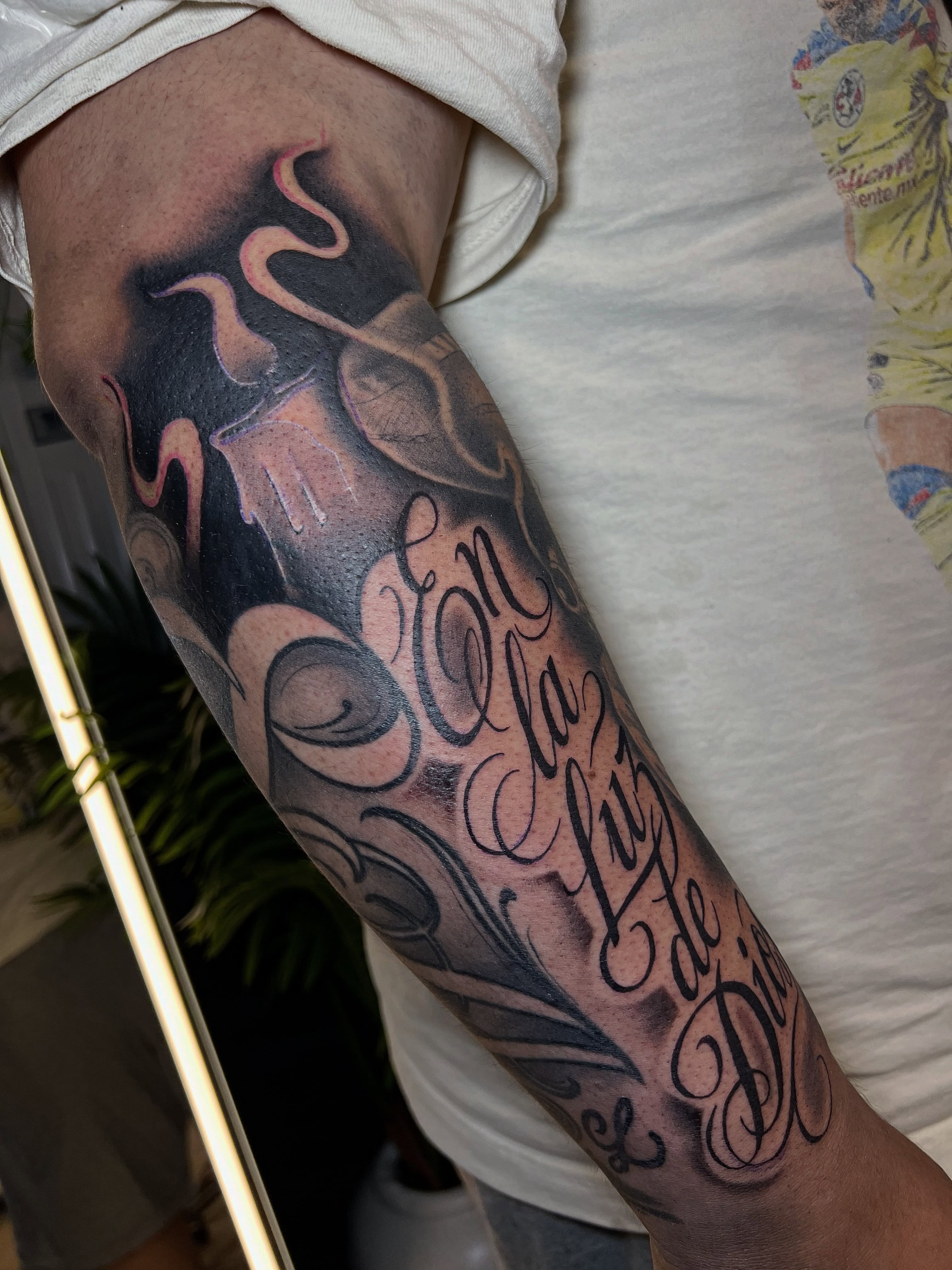 Script lettering lettering script tattoo on the forearm by Dallas tx tattoo artist ✝️