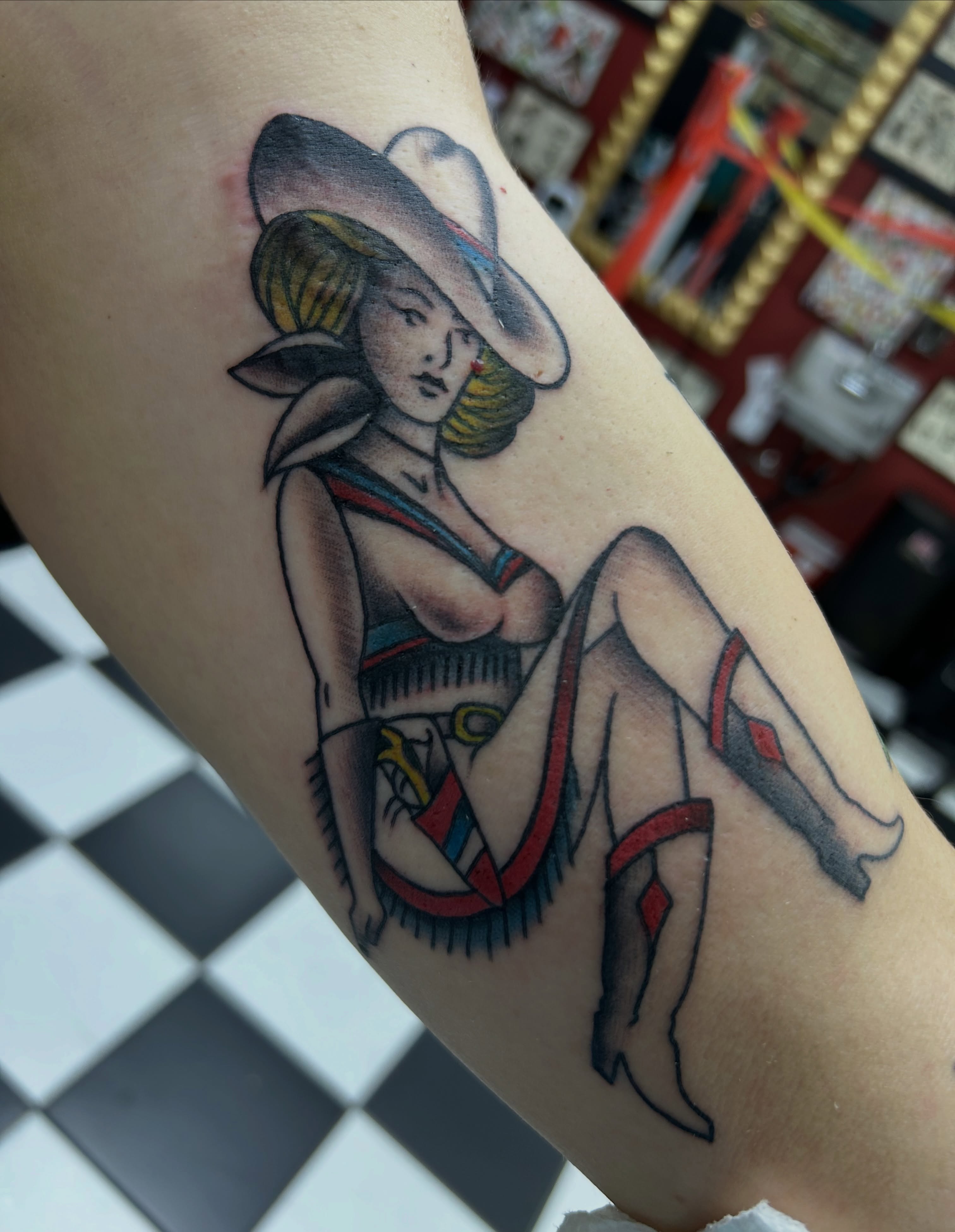 Pin-up girl American traditional tattoo on the forearm by Tattoos by Corey aka MrLu