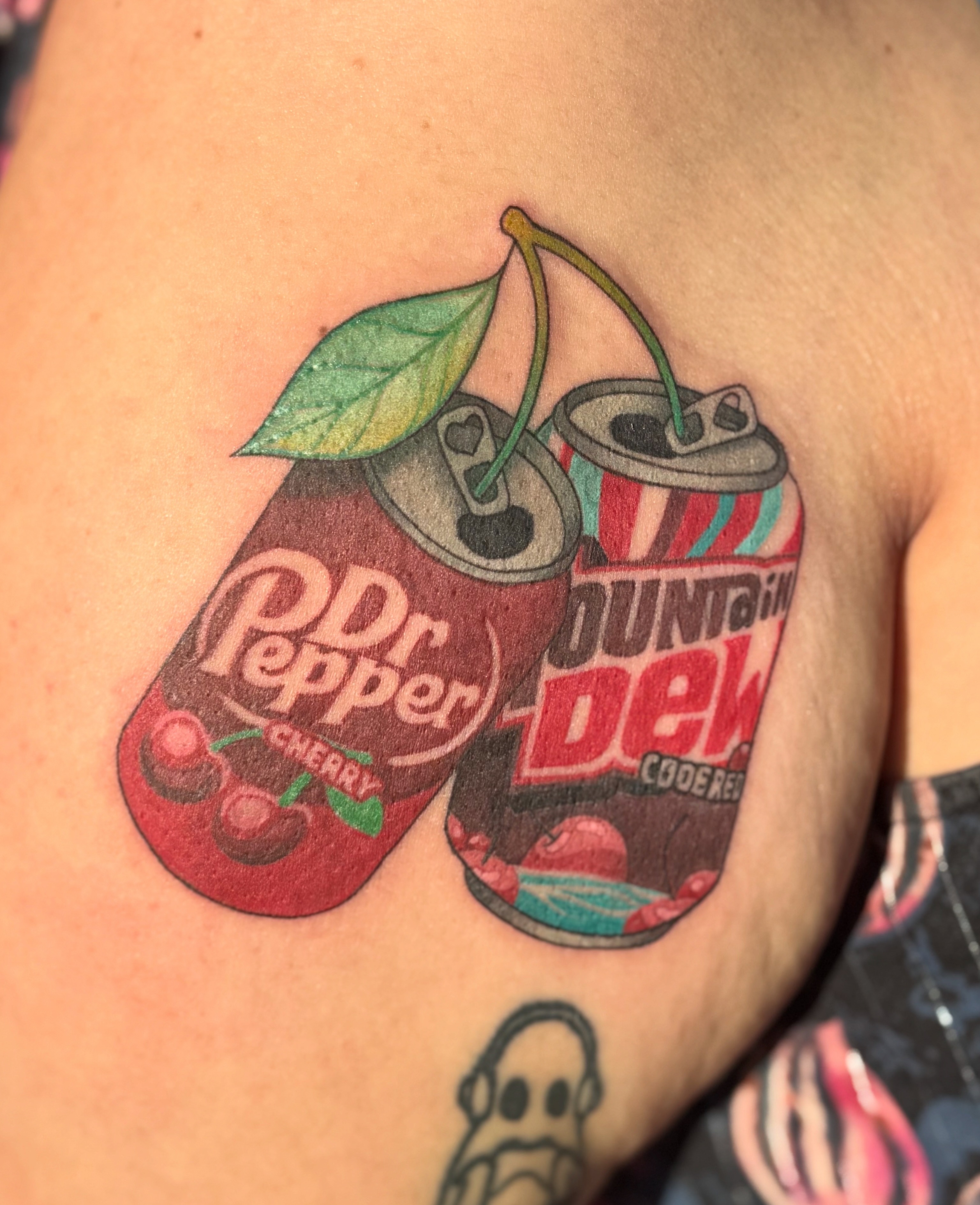Dr pepper cherry can and mountain dew can realism tattoo on the shoulder by Leti
