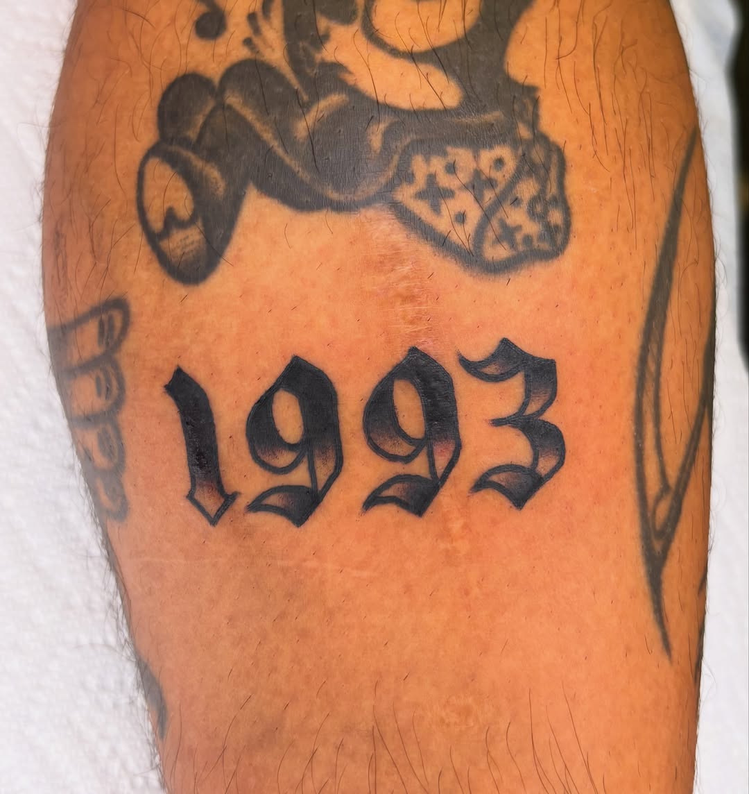 1993 black and grey tattoo on the forearm by ✨ Gabi ✨