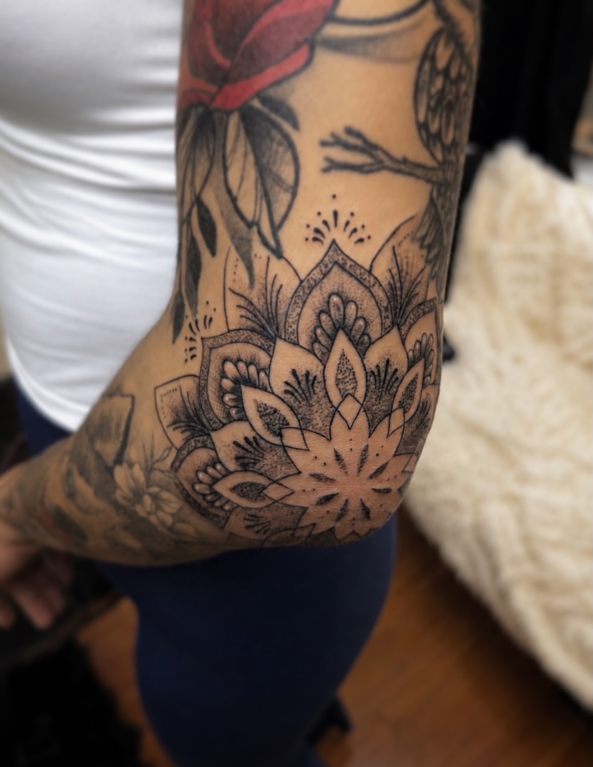 Lotus flower dotwork tattoo on the forearm by Kraken ink Tattoo, San Francisco, California