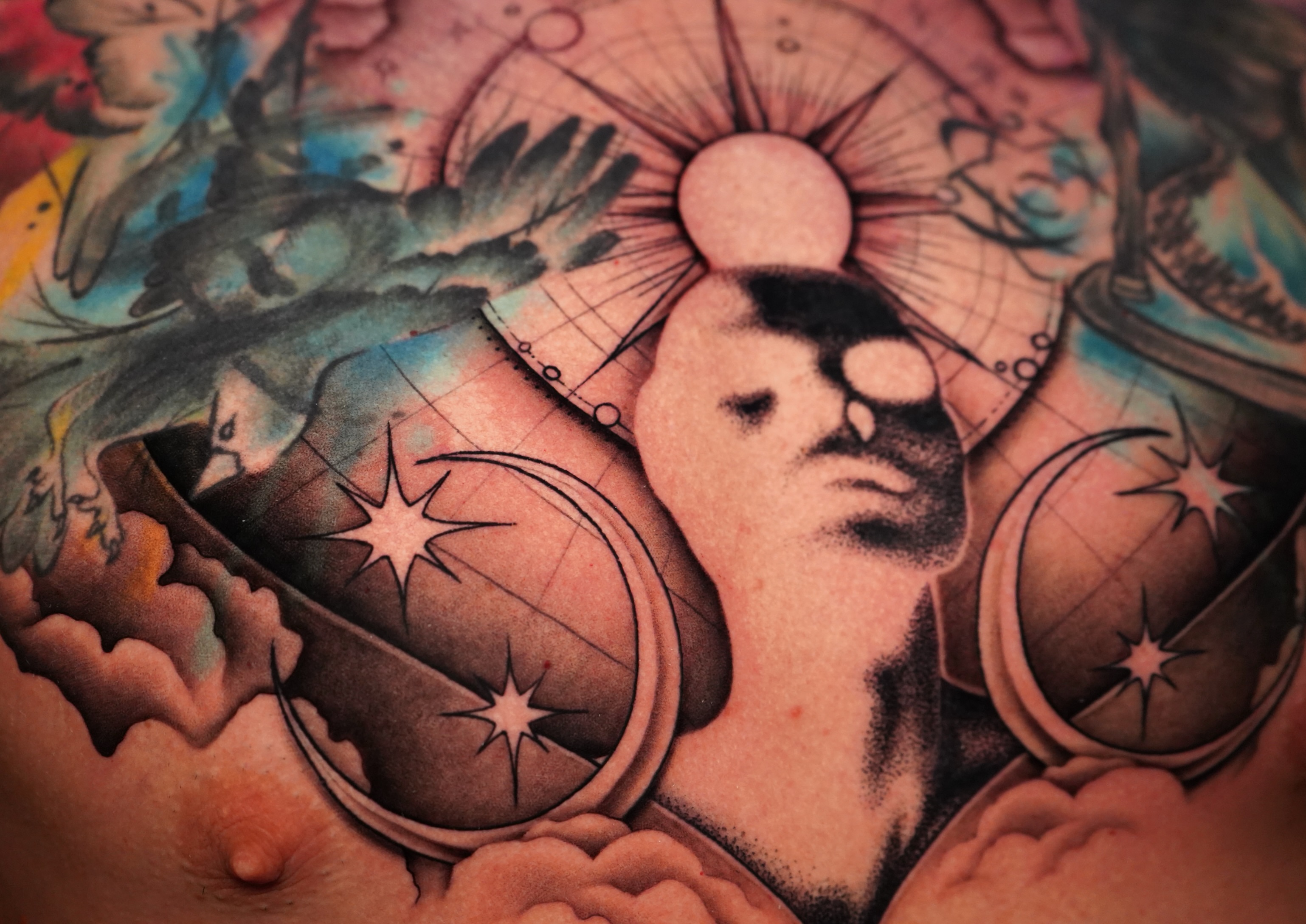 Astronomical symbols neo-traditional tattoo on the chest by Haley Corinne