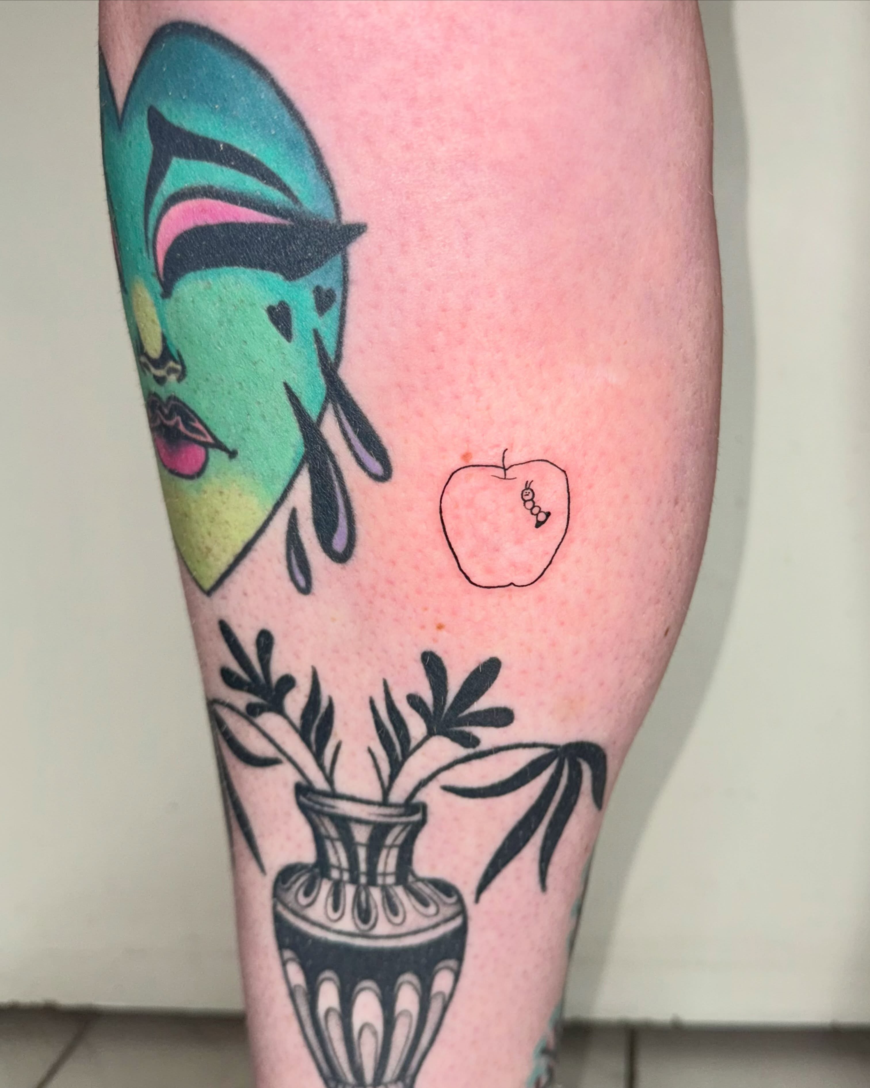 Mask, apple, vase American traditional tattoo on the forearm by 림구타투