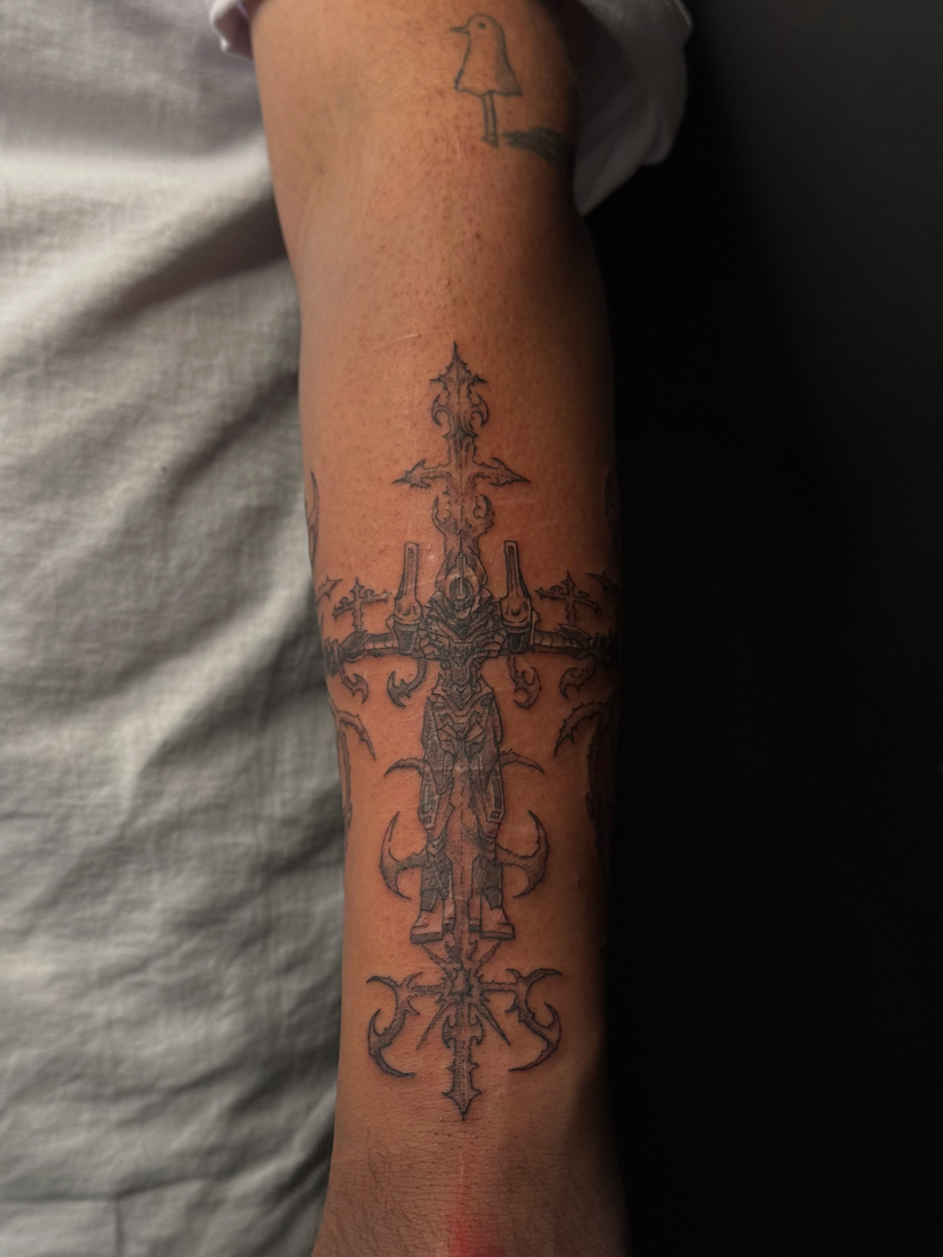 Cross black and grey tattoo on the forearm by dewduls :), Berkeley, California