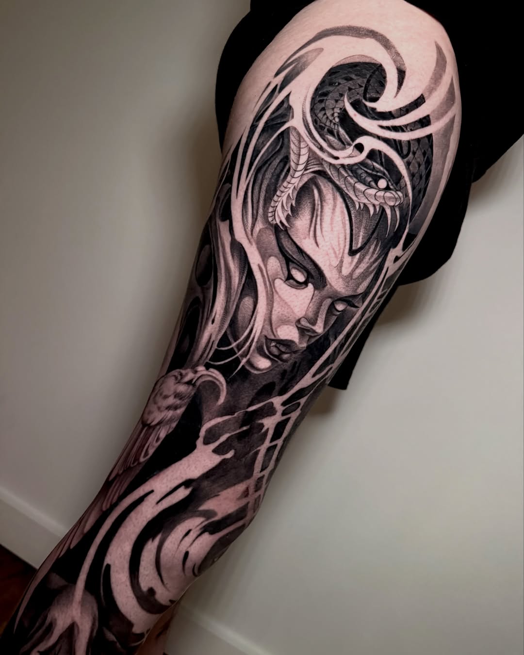 Woman's face realism tattoo on the forearm by Michelle Carlton