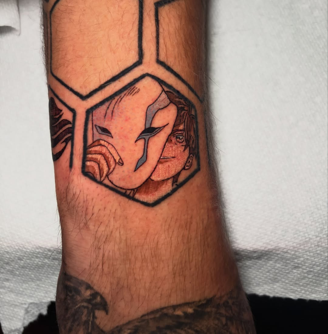 Anime characters anime tattoo on the forearm by Ashley Denise