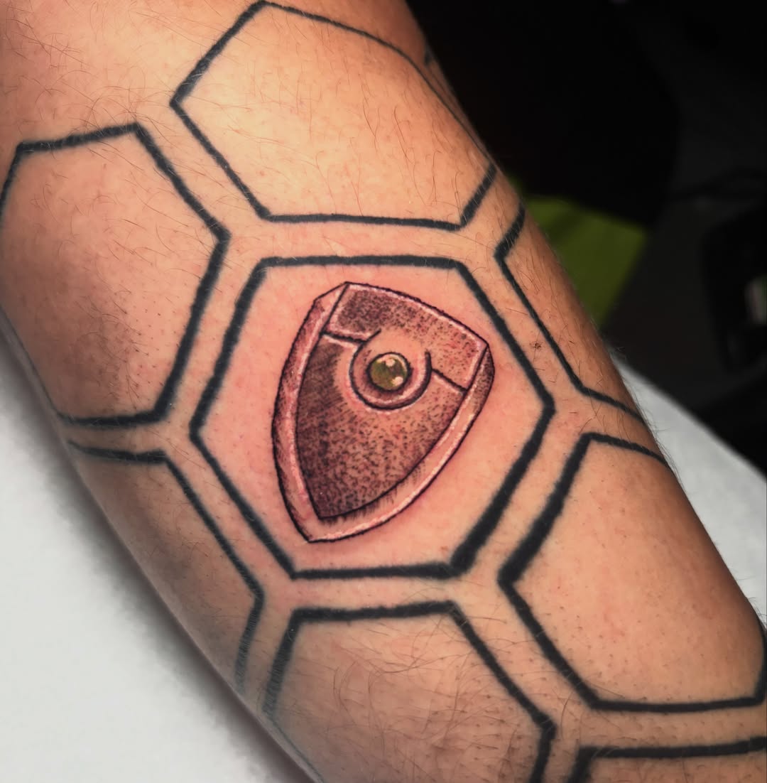 Eye geometric tattoo on the forearm by Ashley Denise
