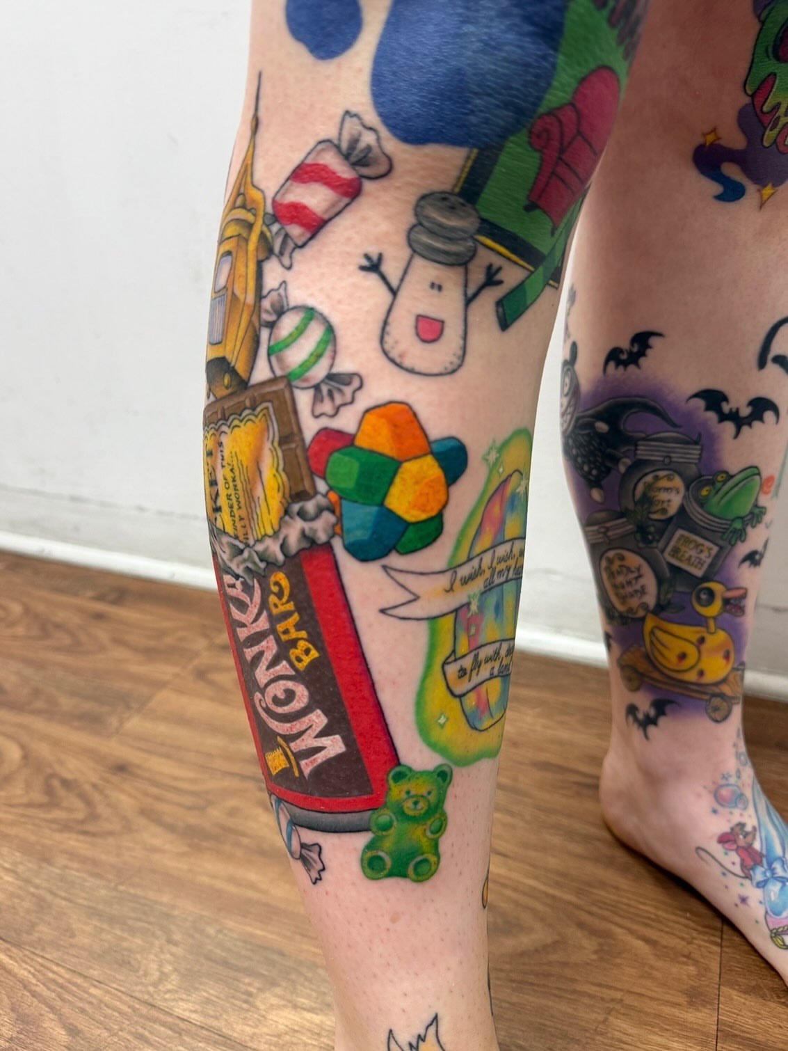 Wonka Bar new school tattoo on the leg by McKenna Chalifoux