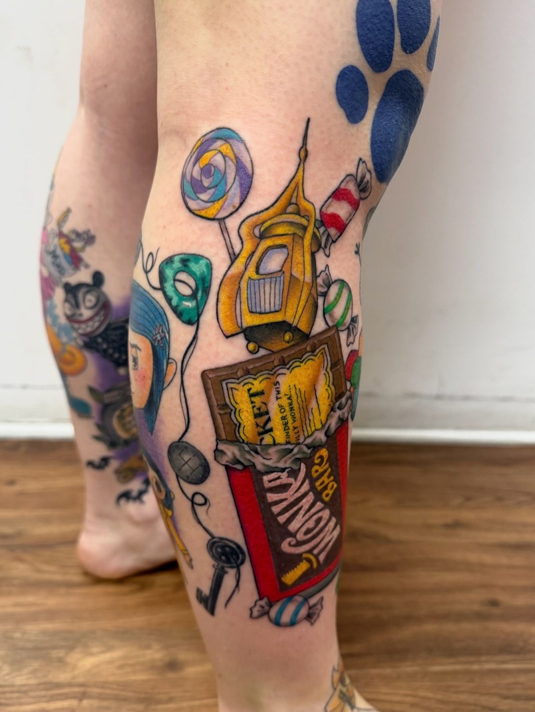 Candy and arcade game American traditional tattoo on the leg by McKenna Chalifoux