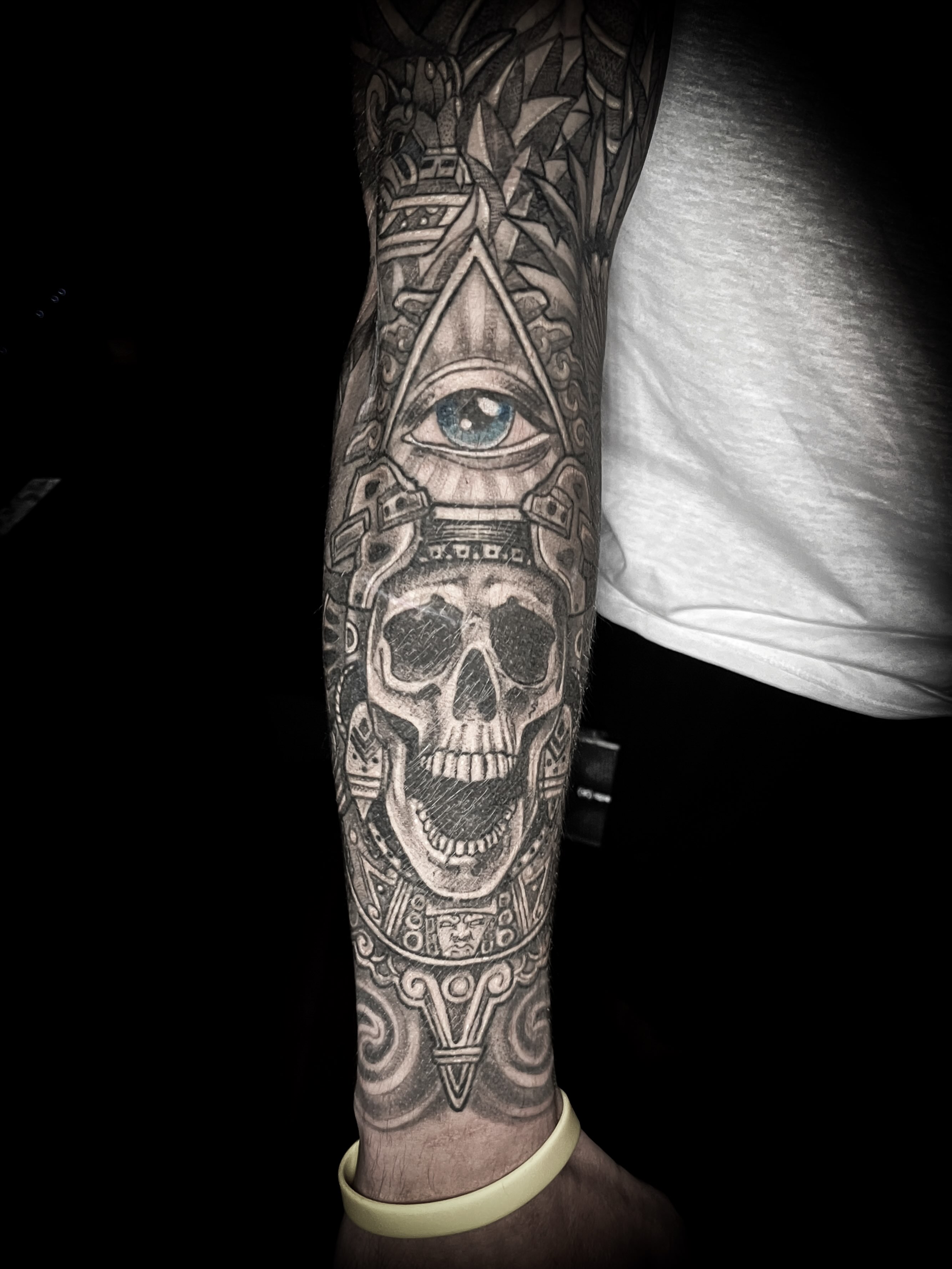 Skull and pyramid geometric tattoo on the forearm by Lindsay Fernandez, Colorado Springs, Colorado