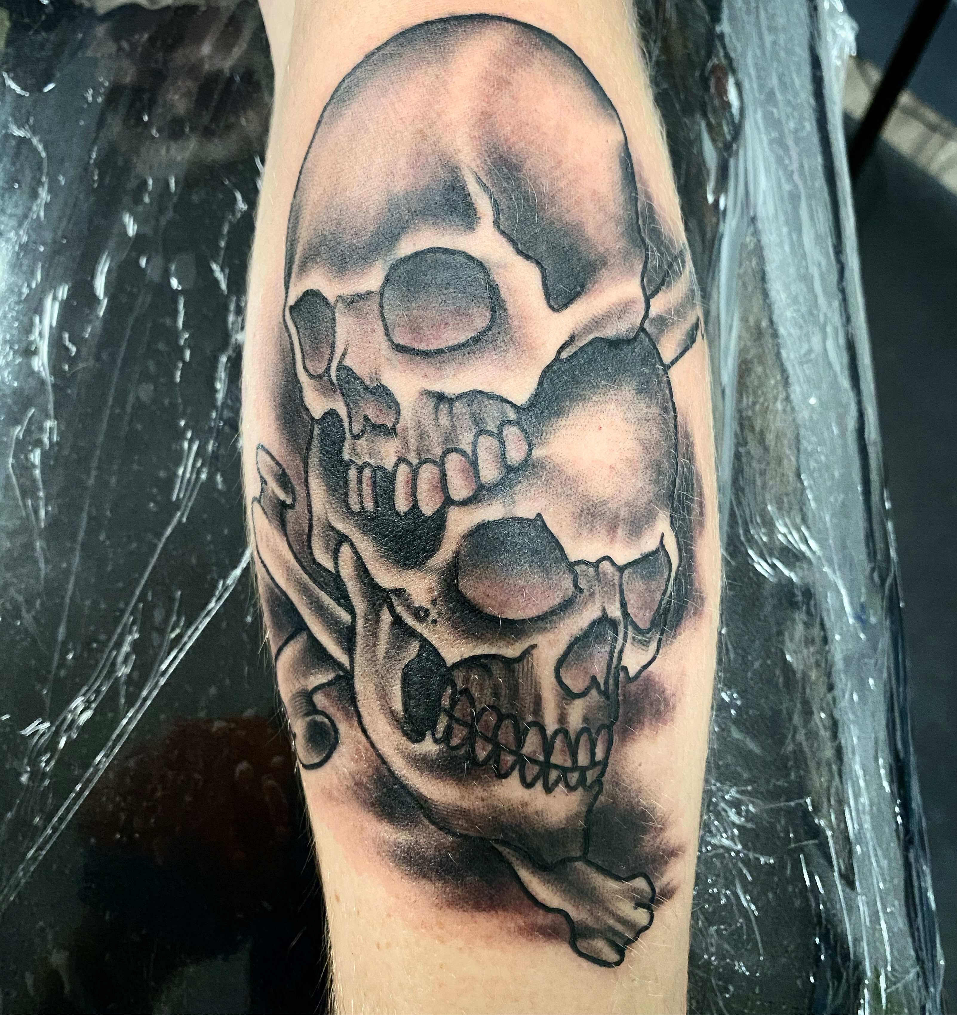 Skull black and grey tattoo on the forearm by Davidsteeletattoos, Dallas, Texas