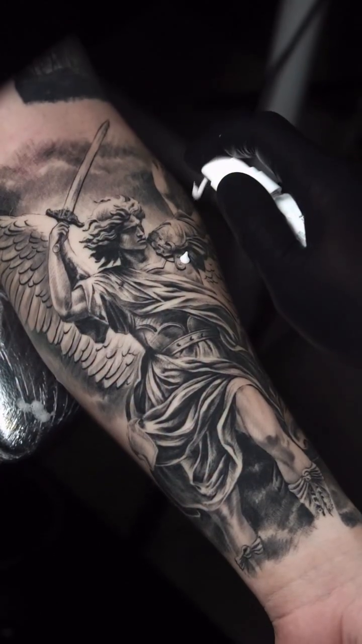 Angel with sword realism tattoo by Bishop Tattoo