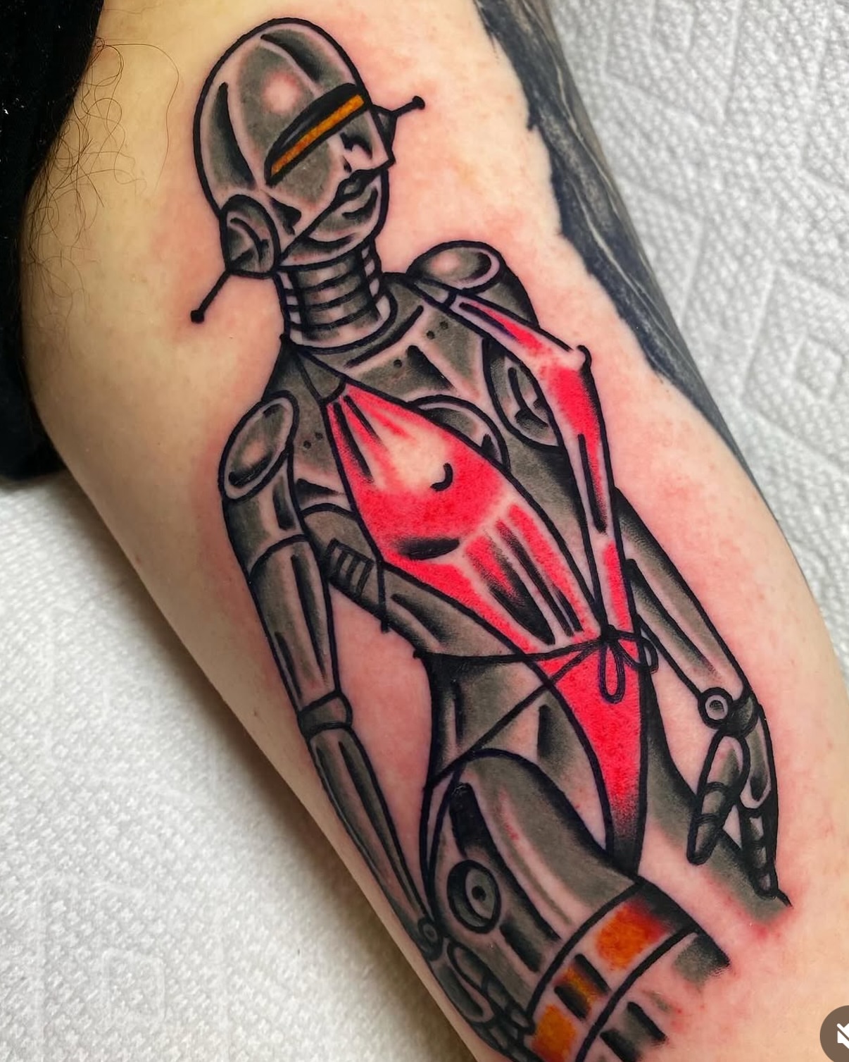 Robot American traditional tattoo on the forearm by Zoe Margot