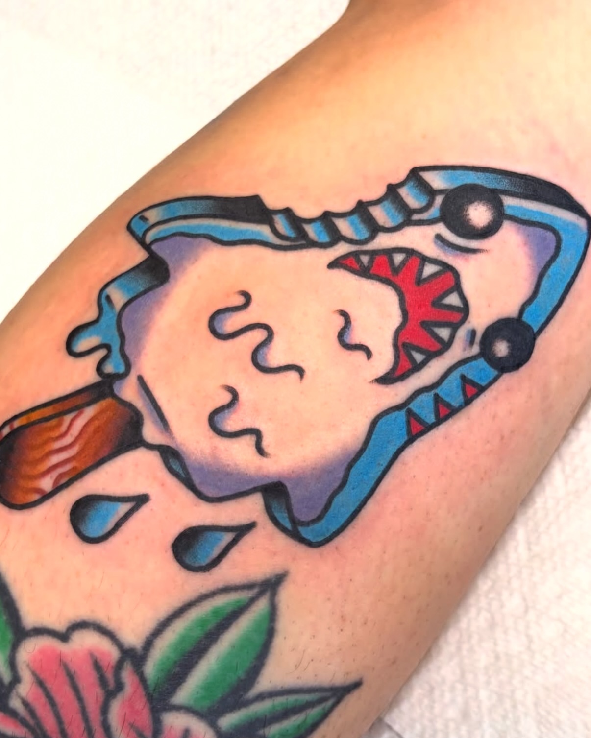 Ice cream cone American traditional tattoo on the forearm by Zoe Margot