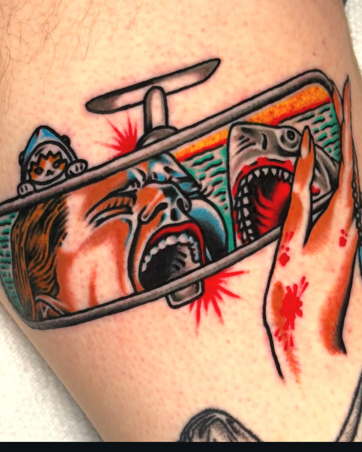 Airplane crash scene American traditional tattoo on the thigh by Zoe Margot