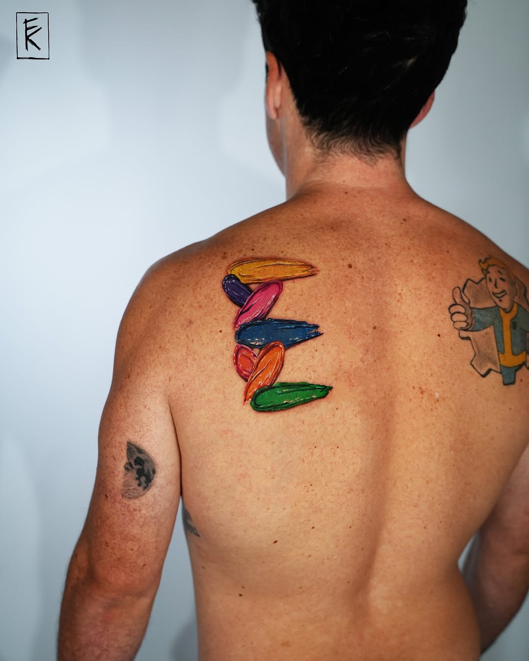 Colorful surfboards geometric tattoo on the back by elizaveta