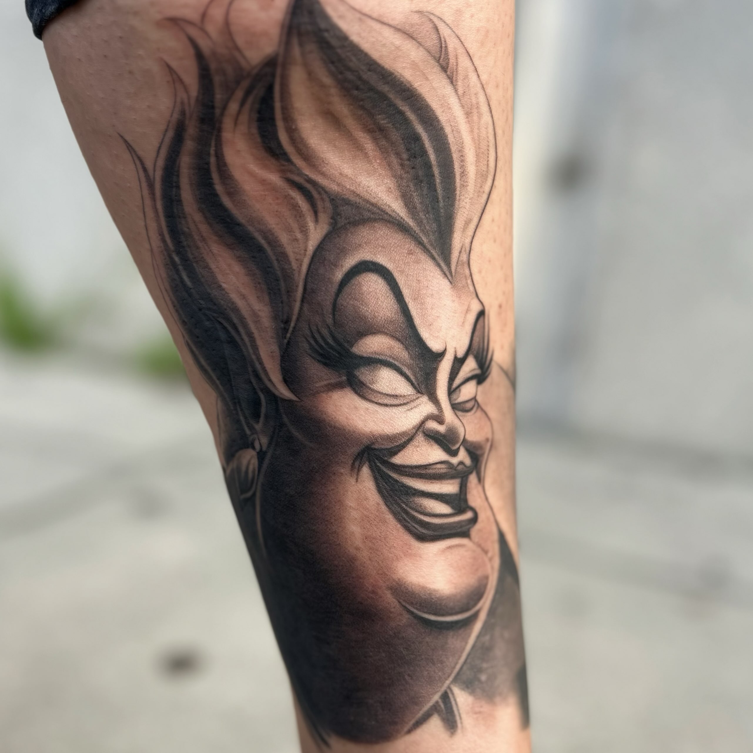 Joker black and grey tattoo on the forearm by Tattoos by Anthony Davis