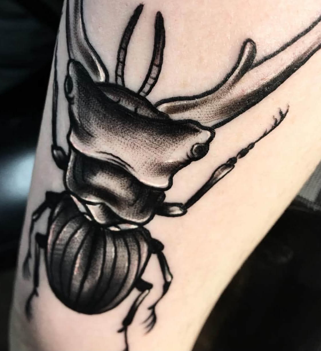Scarab beetle black and grey tattoo on the forearm by Brandon Harrison, Kansas City, Missouri