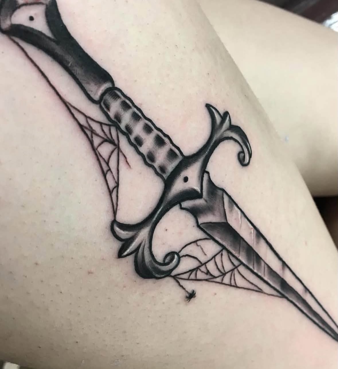 Sword black and grey tattoo on the forearm by Brandon Harrison, Kansas City, Missouri