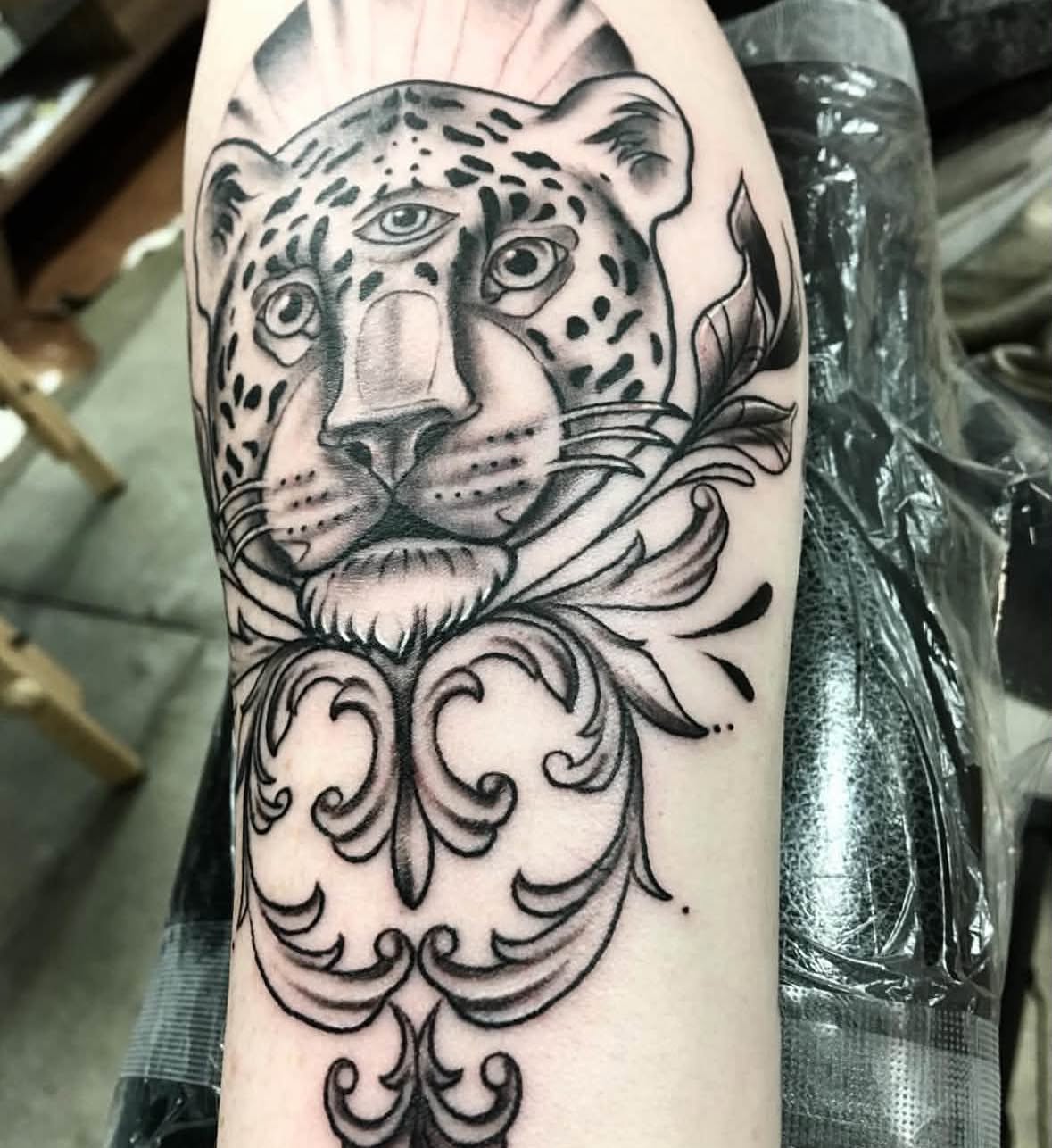 Leopard realism tattoo on the forearm by Brandon Harrison, Kansas City, Missouri