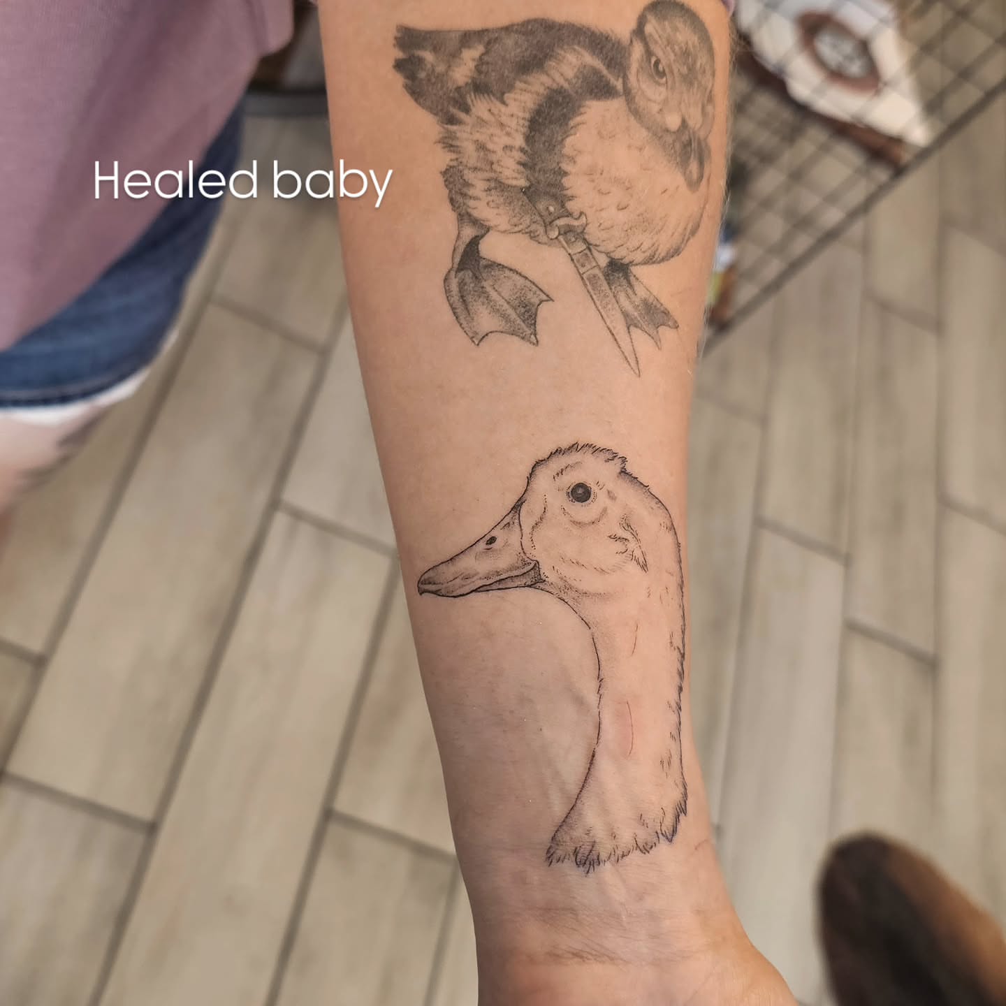 Ducks black and grey tattoo on the forearm by Casey Jo