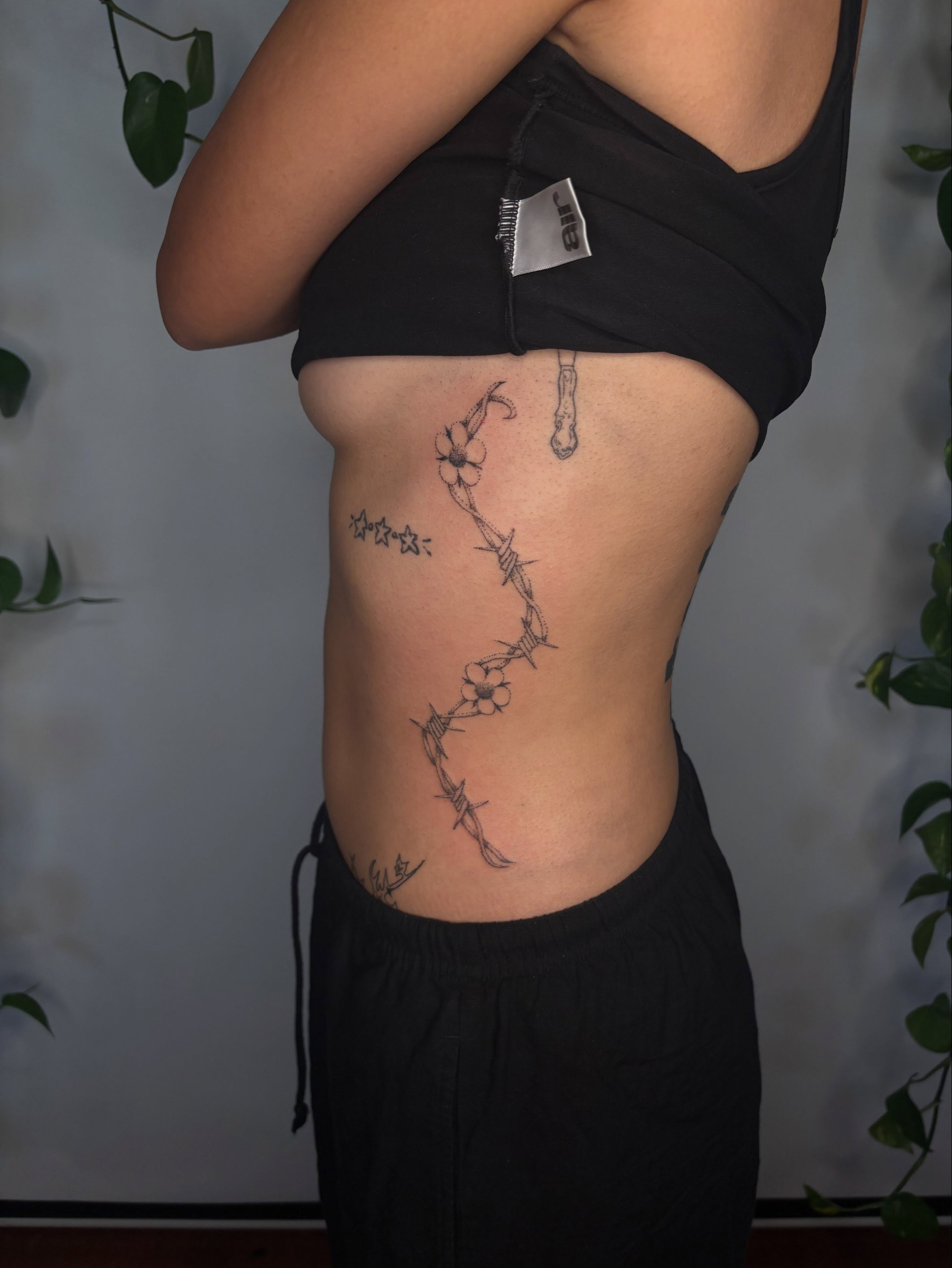 Barbed wire and flowers black and grey tattoo on the ribs by sabrina ✿ ◔ ں ◔ ✿ san francisco tattoo!