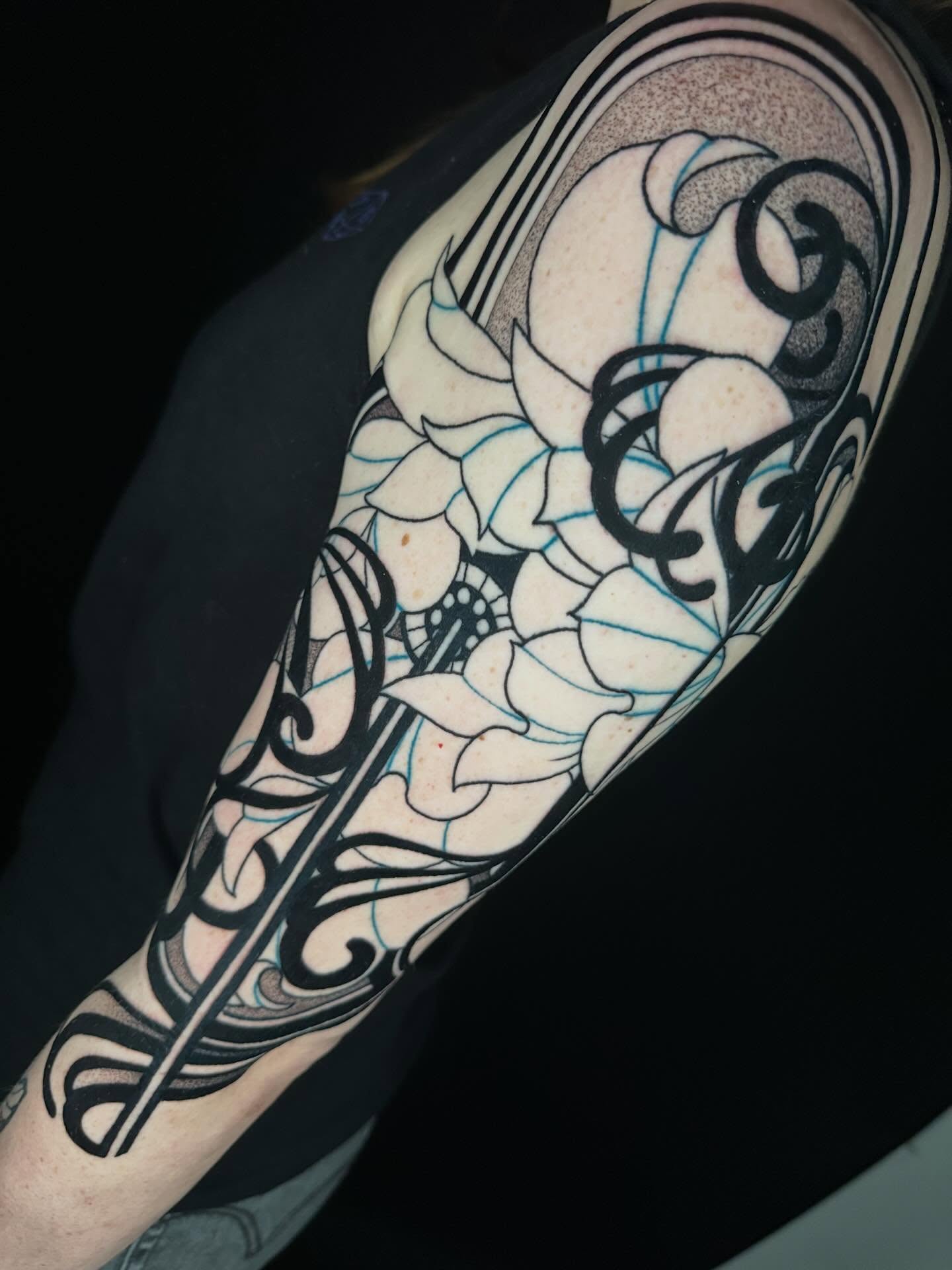 Floral design ornamental tattoo on the forearm by Will Spencer