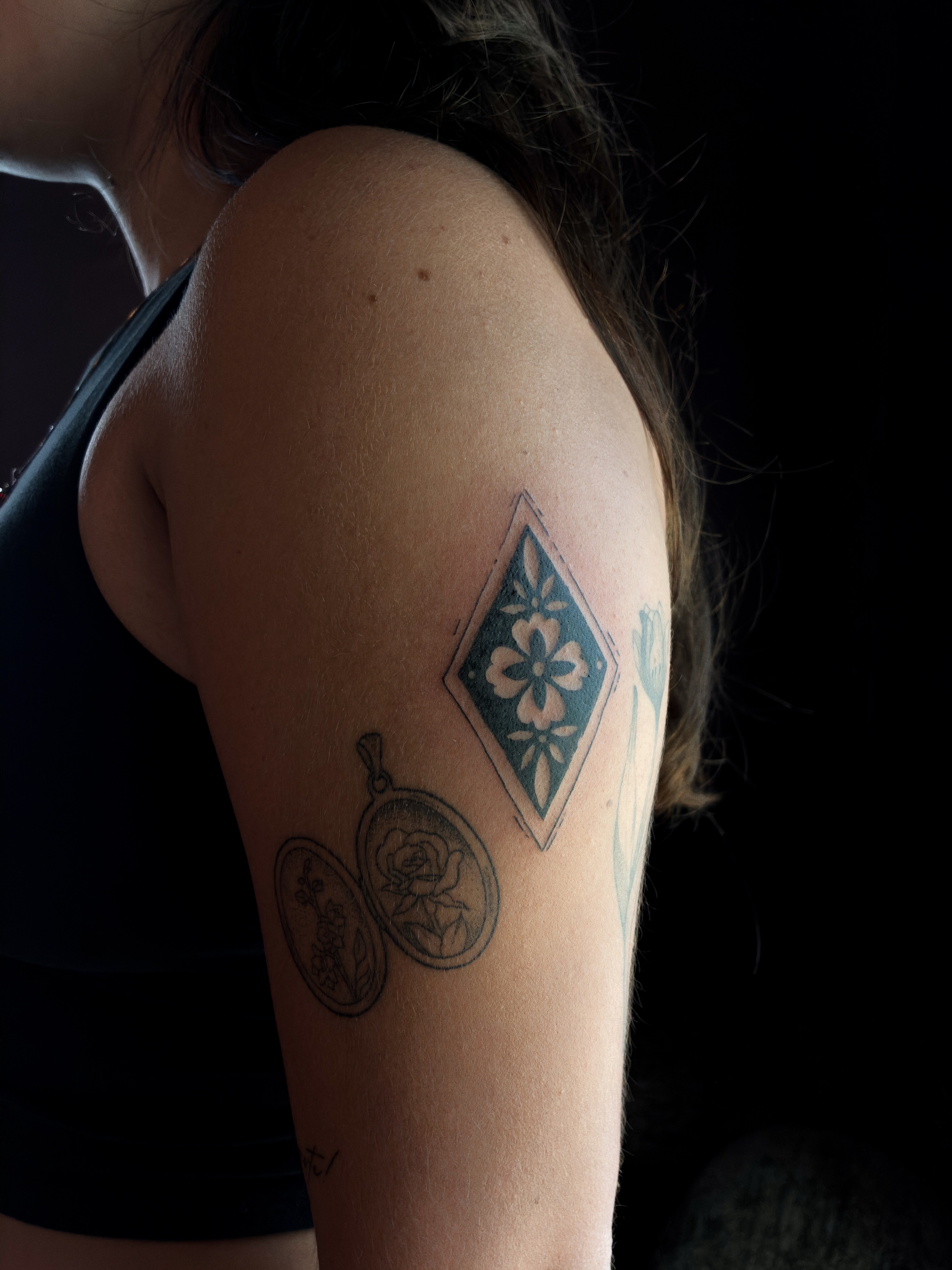 Diamond with floral design geometric tattoo on the shoulder by ⊹ Avery Peterson ⊹